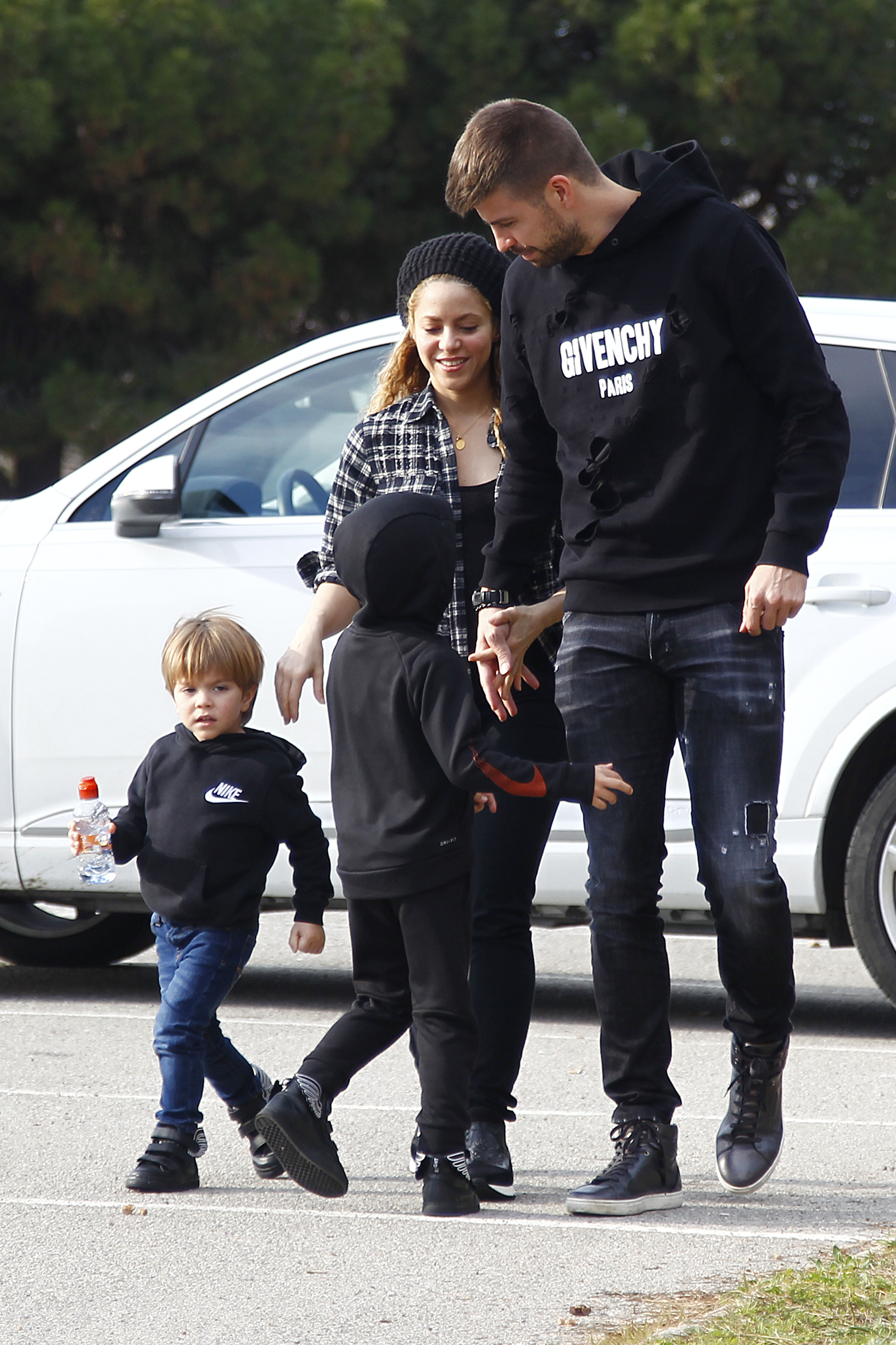 EXCLUSIVE: Shakira and partner Gerard Pique are seen with sons Milan and Sasha in Barcelona, Spain. 
The couple looked loved-up after their relationship became the subject of rumours late last year.
The happy family was heading to the Disney on Ice show at the Palau Sant Jordi in Barcelona.
Shakira, 41, who battled a vocal chord haemorrhage towards the end of 2017, was all smiles.
Barcelona FC star Pique, 31, wore a Givenchy hooded top while the kids were dressed in Nike and adidas Jeremy Scott trainers / sneakers.

<P>
Pictured: Shakira, Gerard Pique, Sasha, Milan
<B>Ref: SPL1661358  190218   EXCLUSIVE</B><BR/>
Picture by: Santi Delgado / Splash News<BR/>
</P><P>
<B>Splash News and Pictures</B><BR/>
Los Angeles:	310-821-2666<BR/>
New York:	212-619-2666<BR/>
London:	870-934-2666<BR/>
<span id=