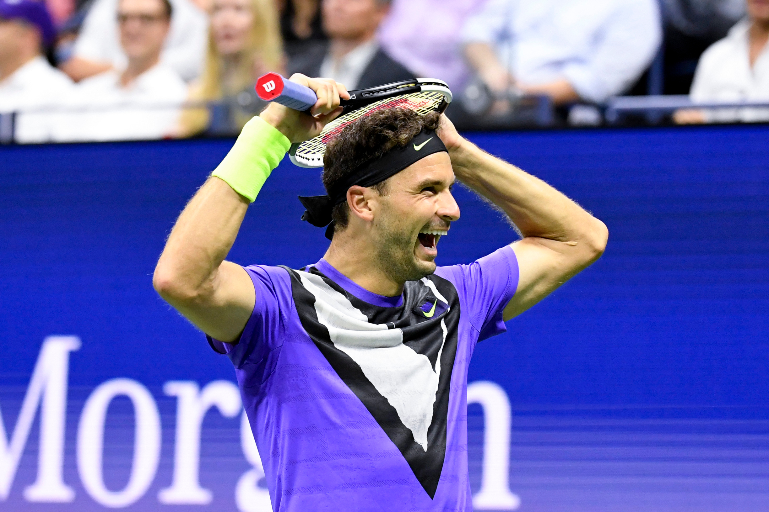 Sep 3, 2019; Flushing, NY, USA; Grigor Dimitrov of Bulgaria wins the quarterfinal match against Roger Federer of Switzerland on day nine of the 2019 US Open tennis tournament at USTA Billie Jean King National Tennis Center. Mandatory Credit: Danielle Parhizkaran-USA TODAY Sports - 13304355