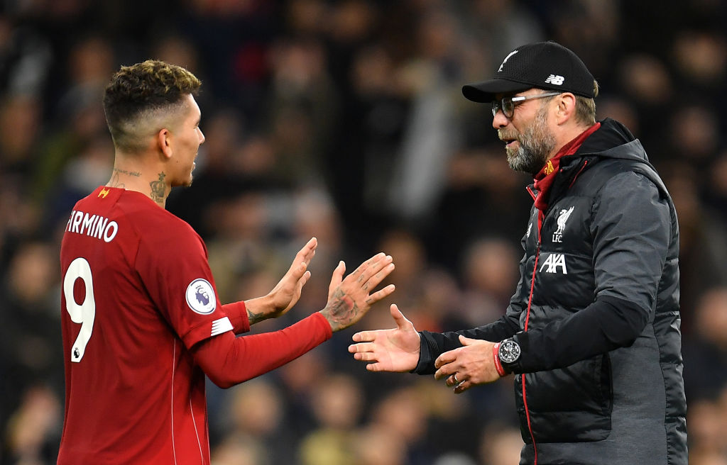 LONDON, ENGLAND - JANUARY 11: Jurgen Klopp, Manager of Liverpool embraces Roberto Firmino of Liverpool following the Premier League match between Tottenham Hotspur and Liverpool FC at Tottenham Hotspur Stadium on January 11, 2020 in London, United Kingdom. (Photo by Justin Setterfield/Getty Images)