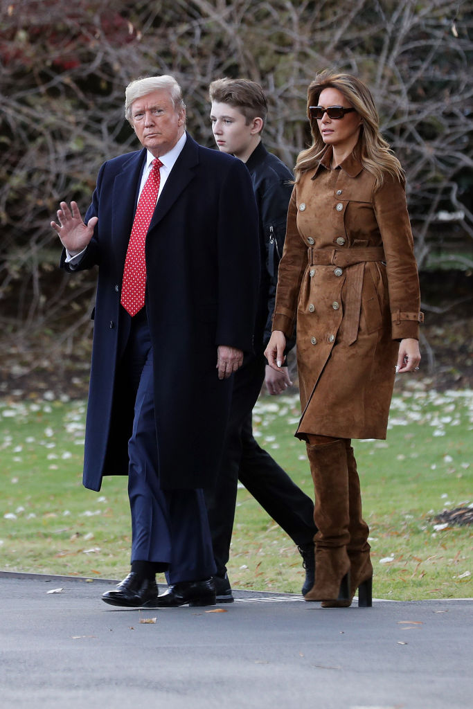 WASHINGTON, DC - NOVEMBER 26: U.S. President Donald Trump, first lady Melania Trump and their son Barron Trump walk across the South Lawn before leaving the White House on board Marine One November 26, 2019 in Washington, DC. Trump is traveling to Florida for a campaign rally and is scheduled to spend the Thanksgiving holiday at his private Mar-a-Lago Club. (Photo by Chip Somodevilla/Getty Images)