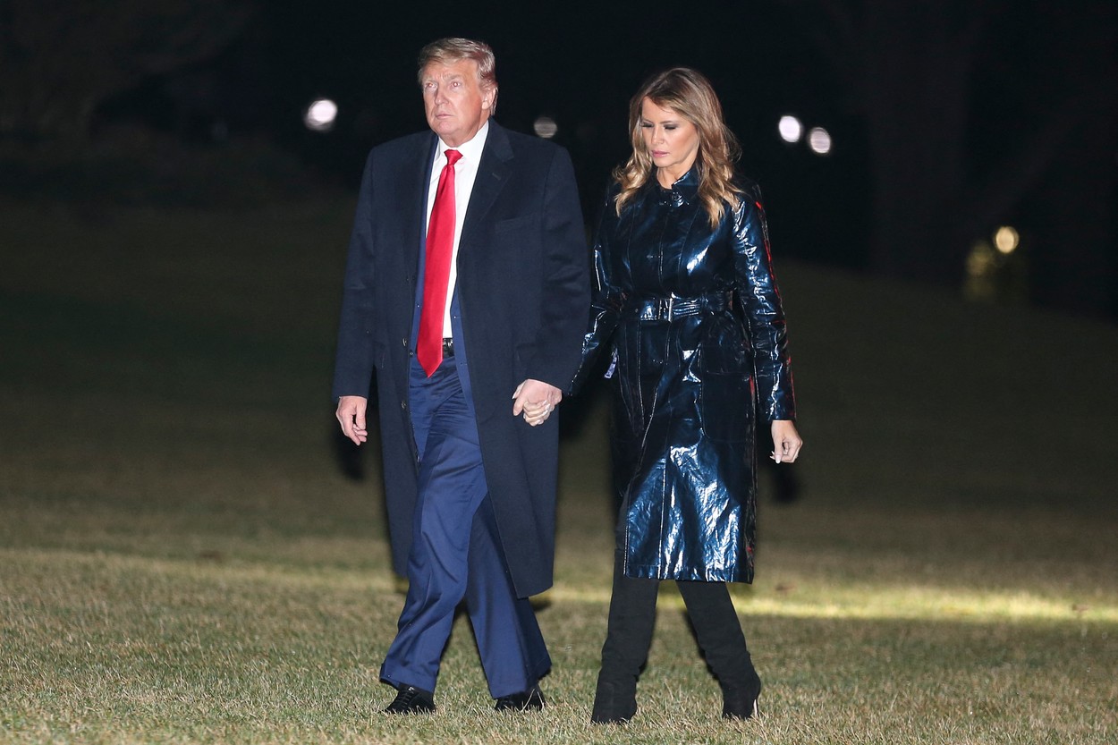 President Donald Trump and first lady Melania Trump walk on the South Lawn as they arrive to the White House on January 14, 2020 in Washington, DC. President Trump and first lady attended the College Football Playoff National Championship in New Orleans, LA., Image: 492644697, License: Rights-managed, Restrictions: , Model Release: no, Credit line: Pool/ABACA / Abaca Press / Profimedia