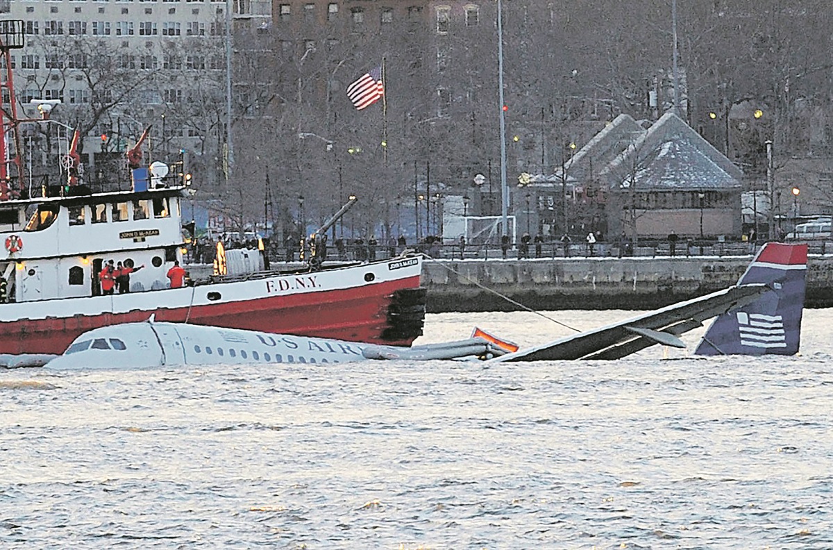 . . . . .  
January 15 2009, New York City
Flight 1549 flying from Laguardia Airport to North Carolina crashed into the Hudson River off the West Side of Manhattan on January 15 2009 in New York City. The Airbus 320 took off from Runway Four at Lagaurdia and was reported to have hit a flock of birds which damaged the aircraft's engines, causing it to loose power. The pilot managed to crash-land on the Hudson and the passengers eveacuated the aircraft from doors over the wings, where they were rescued by the nunerous ferries and other boats., Image: 29037394, License: Rights-managed, Restrictions: Please credit photographer. Agents please include photographer's name on sales reports., Model Release: no, Credit line: KRISTIN CALLAHAN / Acepixs / Profimedia