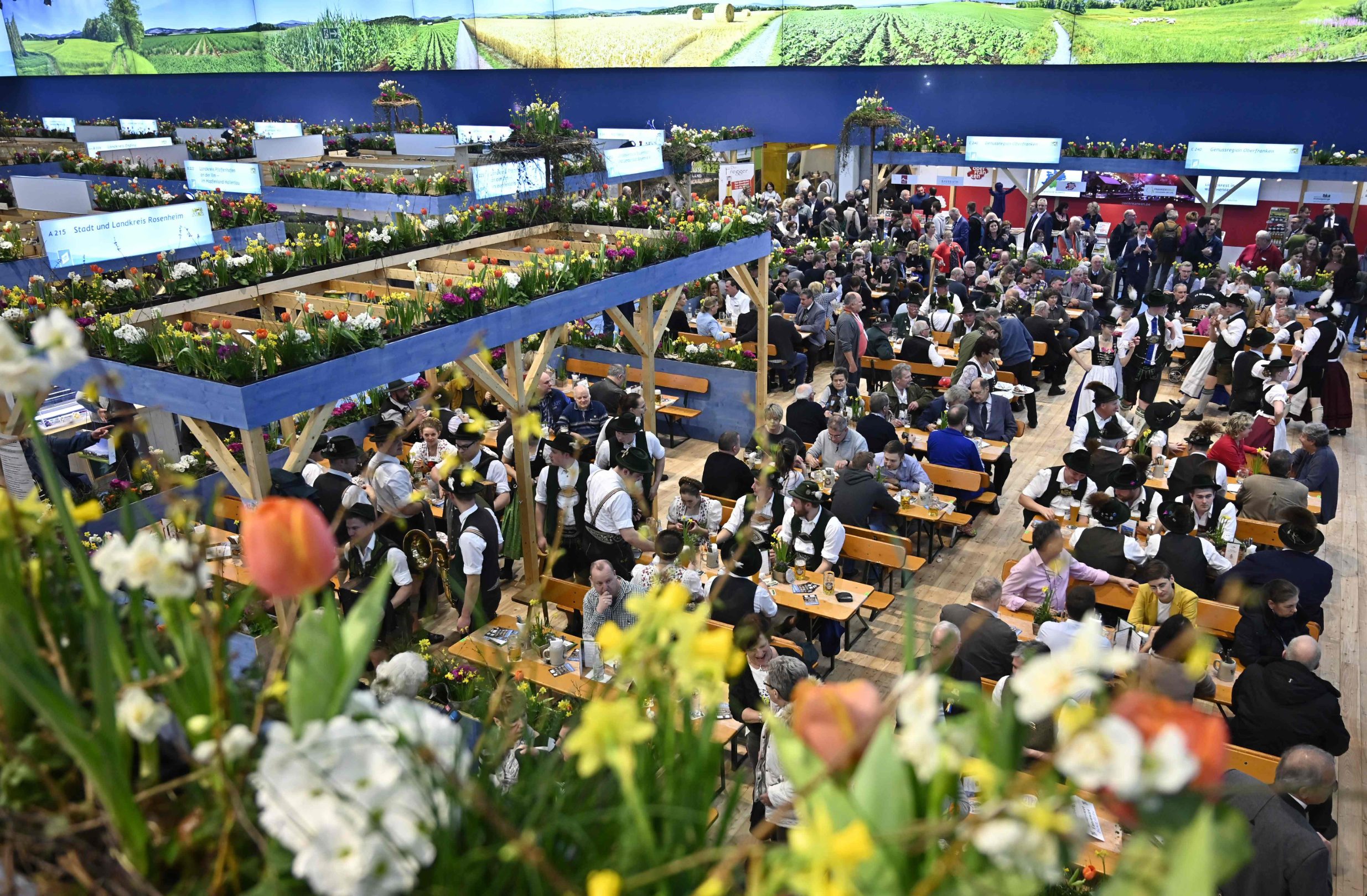 An overview shows the booth of the German federal state of Bavaria during the opening day of the Gruene Woche (Green Week) international agriculture fair in Berlin on January 17, 2020. - The fair officially opens on January 17, 2020 and runs until January 26, with Croatia as partner country of the Green Week 2020. (Photo by Tobias SCHWARZ / AFP)