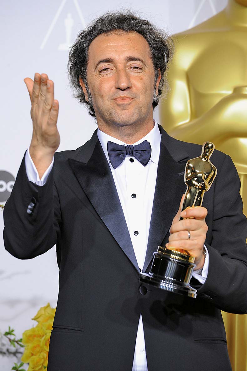 HOLLYWOOD, CA - MARCH 02:  Filmmaker Paolo Sorrentino poses in the press room during the Oscars at Loews Hollywood Hotel on March 2, 2014 in Hollywood, California.  (Photo by Steve Granitz/WireImage)