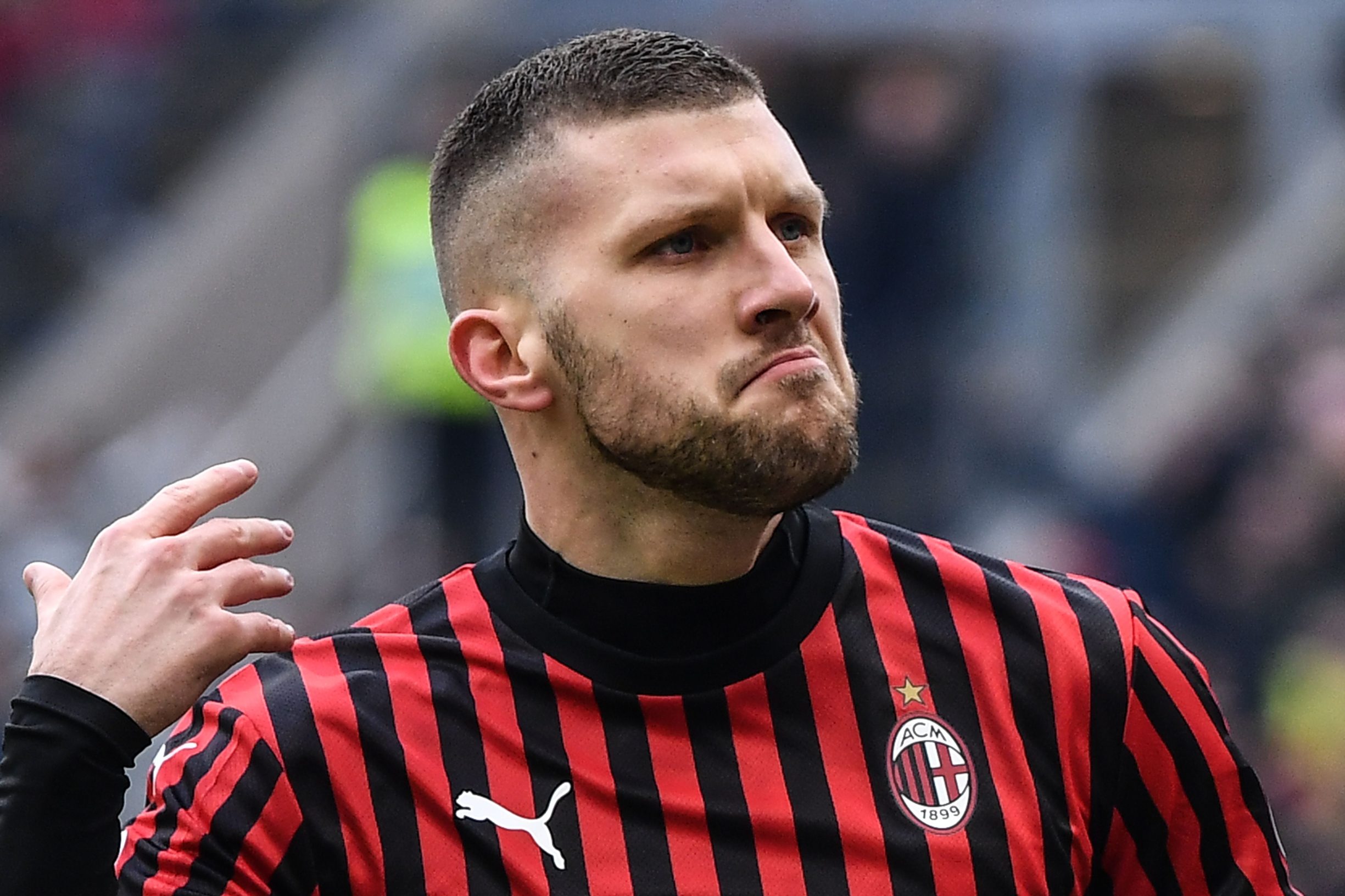 AC Milan's Croatian forward Ante Rebic celebrates after scoring an equalizer during the Italian Serie A football match AC Milan vs Udinese on January 19, 2020 at the San Siro stadium in Milan. (Photo by Marco Bertorello / AFP)