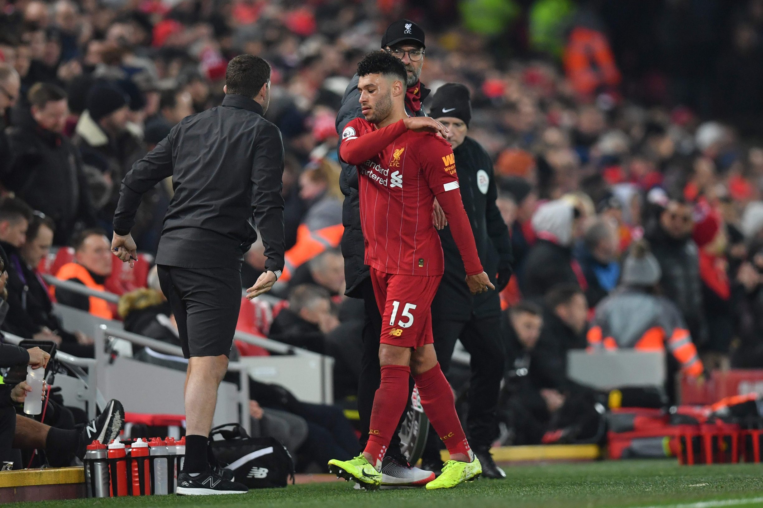 Liverpool's English midfielder Alex Oxlade-Chamberlain reacts as he leaves the pitch substituted during the English Premier League football match between Liverpool and Manchester United at Anfield stadium in Liverpool, north west England on January 19, 2020. (Photo by Paul ELLIS / AFP) / RESTRICTED TO EDITORIAL USE. No use with unauthorized audio, video, data, fixture lists, club/league logos or 'live' services. Online in-match use limited to 120 images. An additional 40 images may be used in extra time. No video emulation. Social media in-match use limited to 120 images. An additional 40 images may be used in extra time. No use in betting publications, games or single club/league/player publications. / 