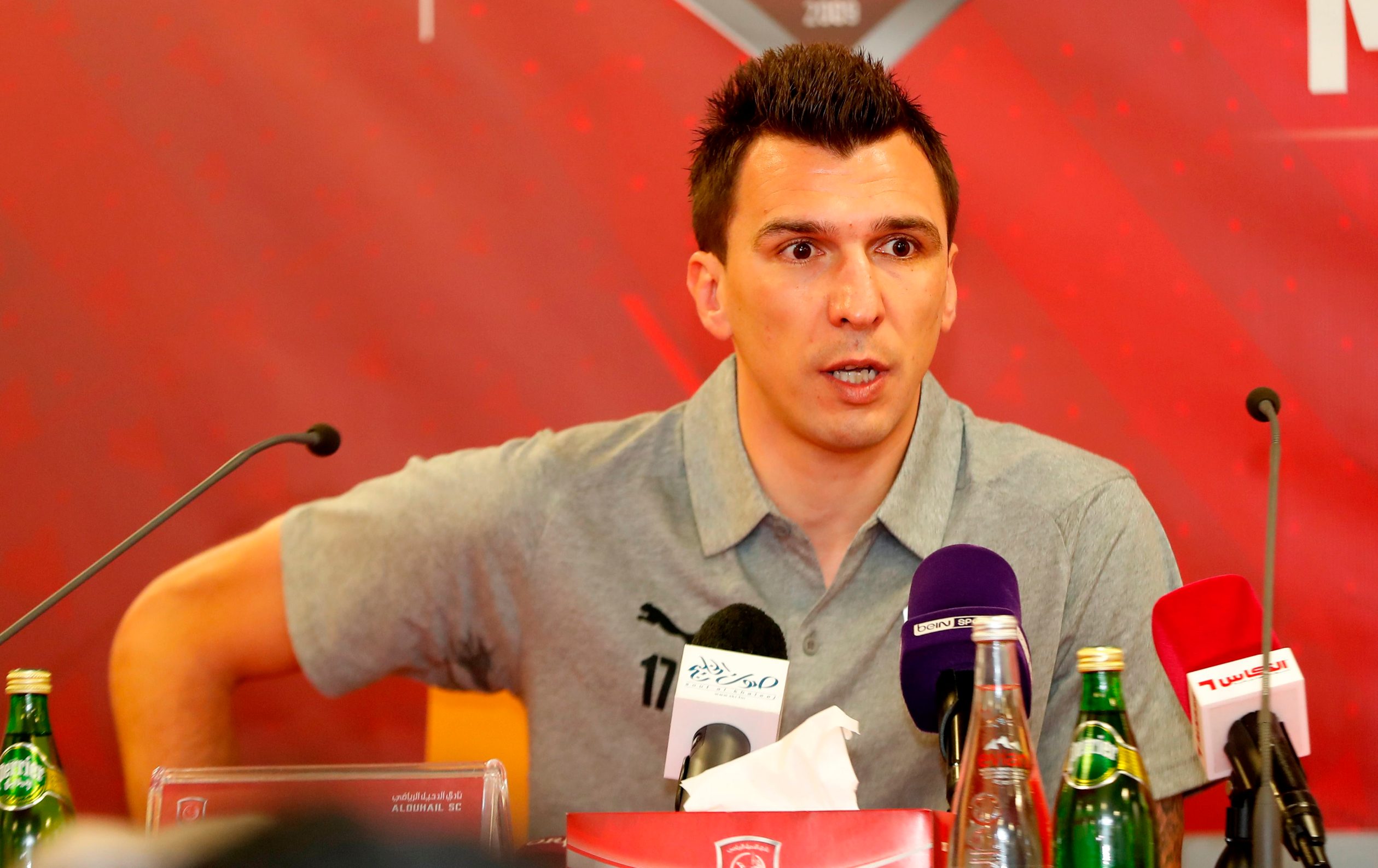 Croatian forward Mario Mandzukic speaks to the press during his introduction as a new player for Qatar's Al Duhail football team on January 2, 2020, in the Qatari capital Doha. - Mandzukic had previously played for Germany's Bayern Munich, Spain's Atletico Madrid and Italy's Juventus before signing for the Qatar club. (Photo by KARIM JAAFAR / AFP)