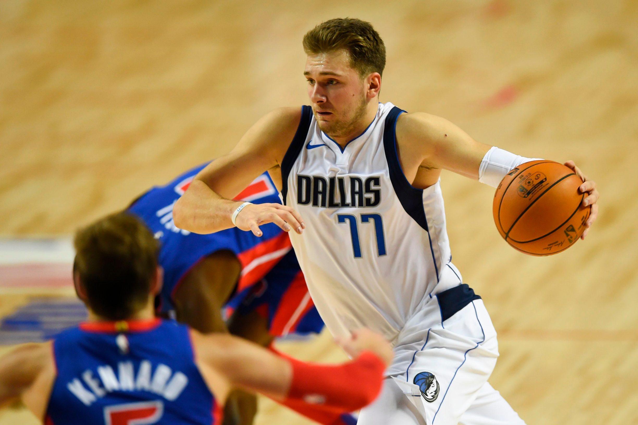 (FILES) In this file photo taken on December 12, 2019 Dallas Mavericks' Slovenian point guard Luka Doncic controls the ball, during their NBA Global Games match against the Detroit pistons at the Mexico City Arena, in Mexico City. - Slovenian guard Luka Doncic edged reigning NBA Most Valuable Player Giannis Antetokounmpo of Milwaukee for the overall lead in early NBA All-Star Game voting results released on January 2, 2020. (Photo by PEDRO PARDO / AFP)