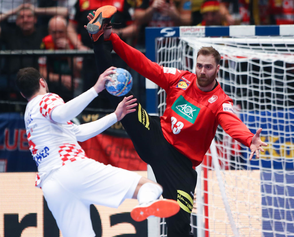 VIENNA, AUSTRIA - JANUARY 18:Domagoj Duvnjak of Croatia throws a goal past Andreas Wolff of Germany during the Men's EHF EURO 2020 main round group I match between Croatia and Germany at Wiener Stadthalle on January 18, 2020 in Vienna, Austria. (Photo by Martin Rose/Bongarts/Getty Images)