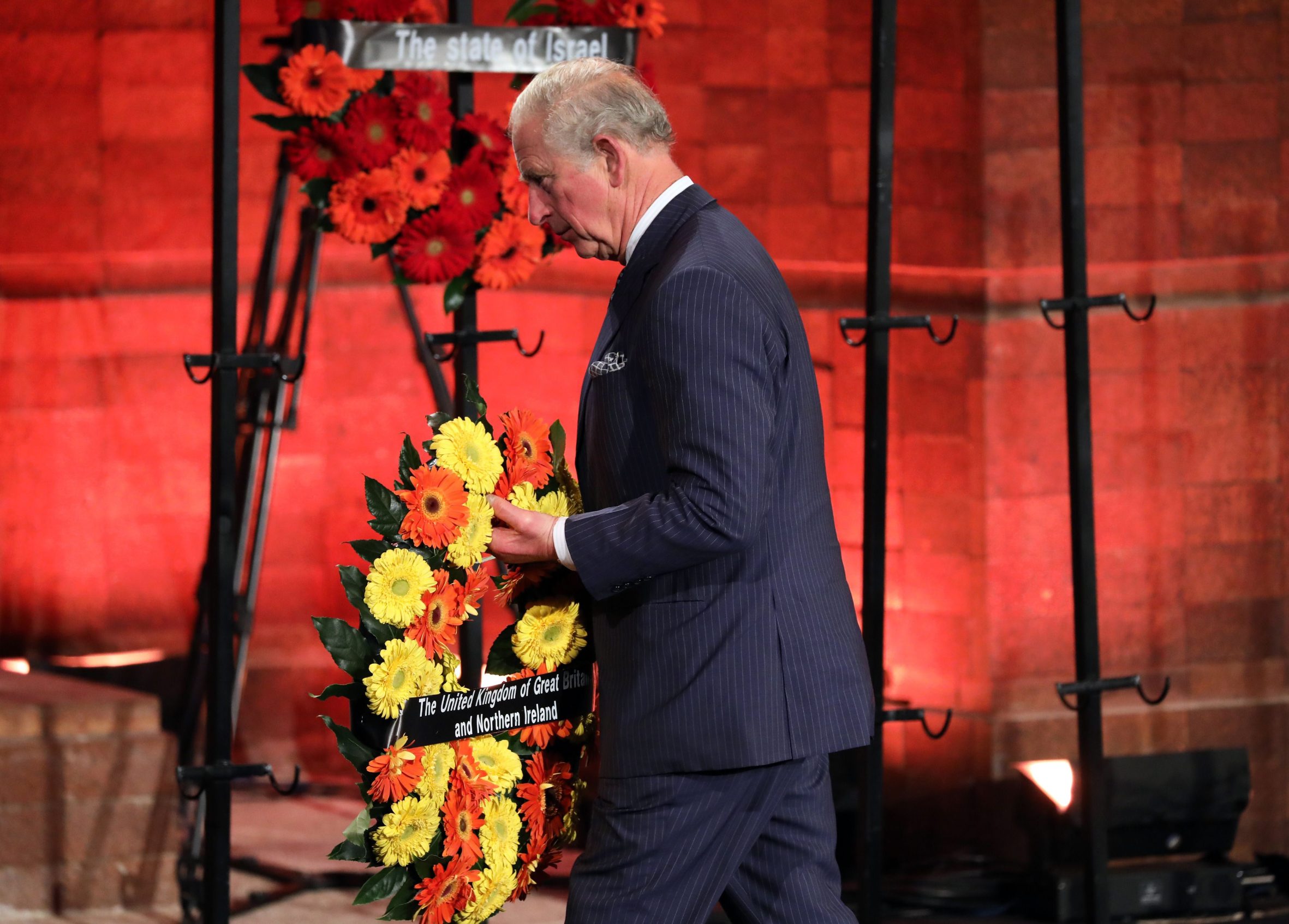 Britains Prince Charles lays a wreath during the Fifth World Holocaust Forum at the Yad Vashem Holocaust memorial museum in Jerusalem on January 23, 2020. - Their faces lined by age and haunting memories, about 100 Holocaust survivors joined political leaders Thursday in Jerusalem to recall the liberation of the Auschwitz death camp 75 years ago. (Photo by Abir SULTAN / POOL / AFP)