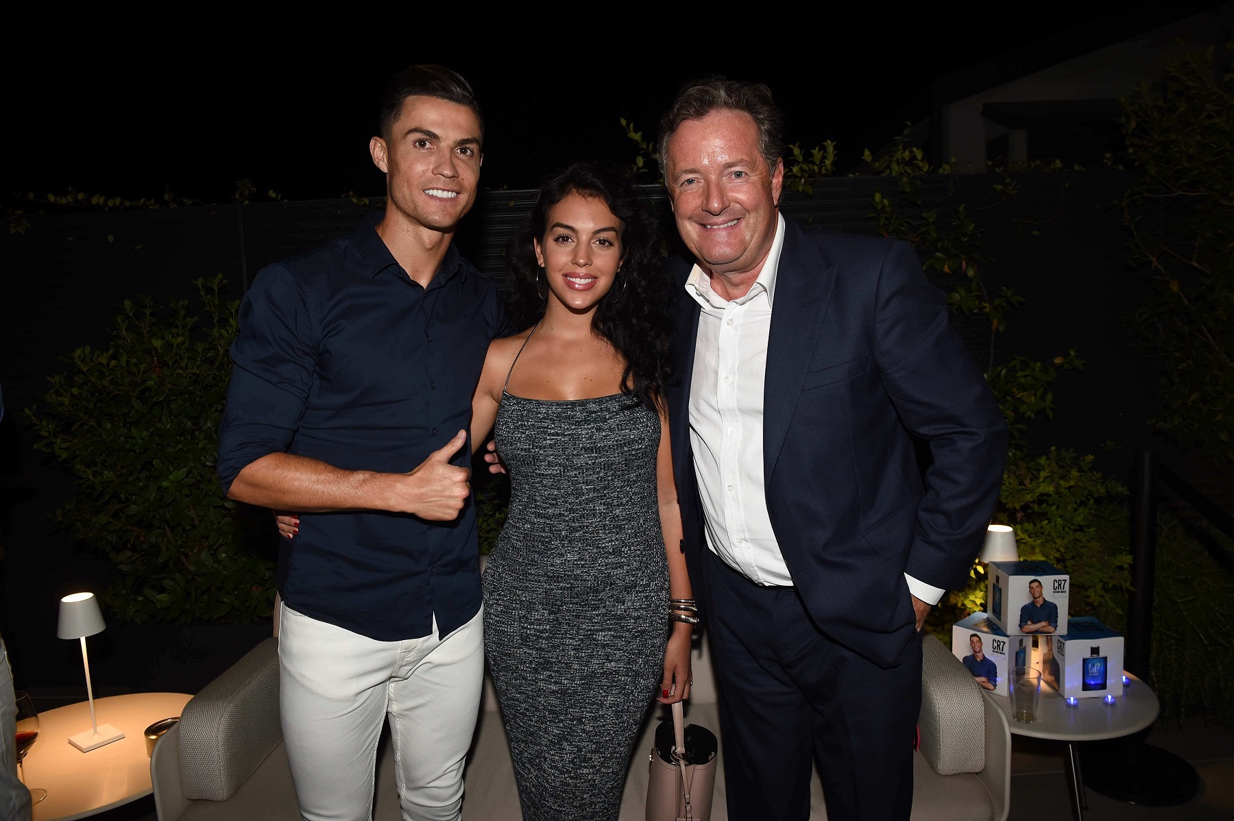 TURIN, ITALY - SEPTEMBER 12: Cristiano Ronaldo, Georgina Rodriguez and Piers Morgan celebrate the launch of new CR7 Play It Cool with friends and family on September 12, 2019 in Turin, Italy. (Photo by Tullio M. Puglia/Getty Images for CR7 Play It Cool)
