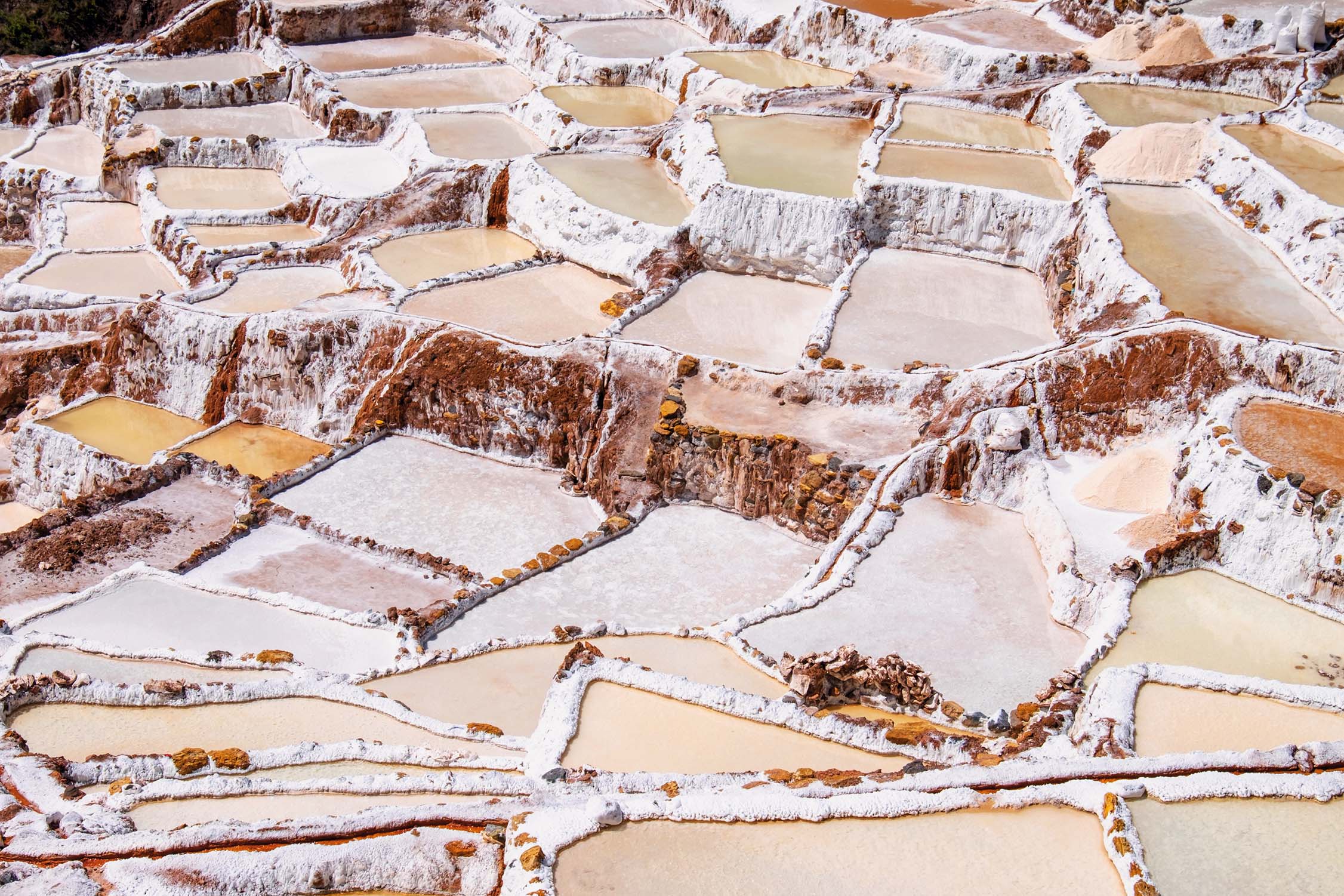 Salt Evaporation Ponds At Maras, Peru