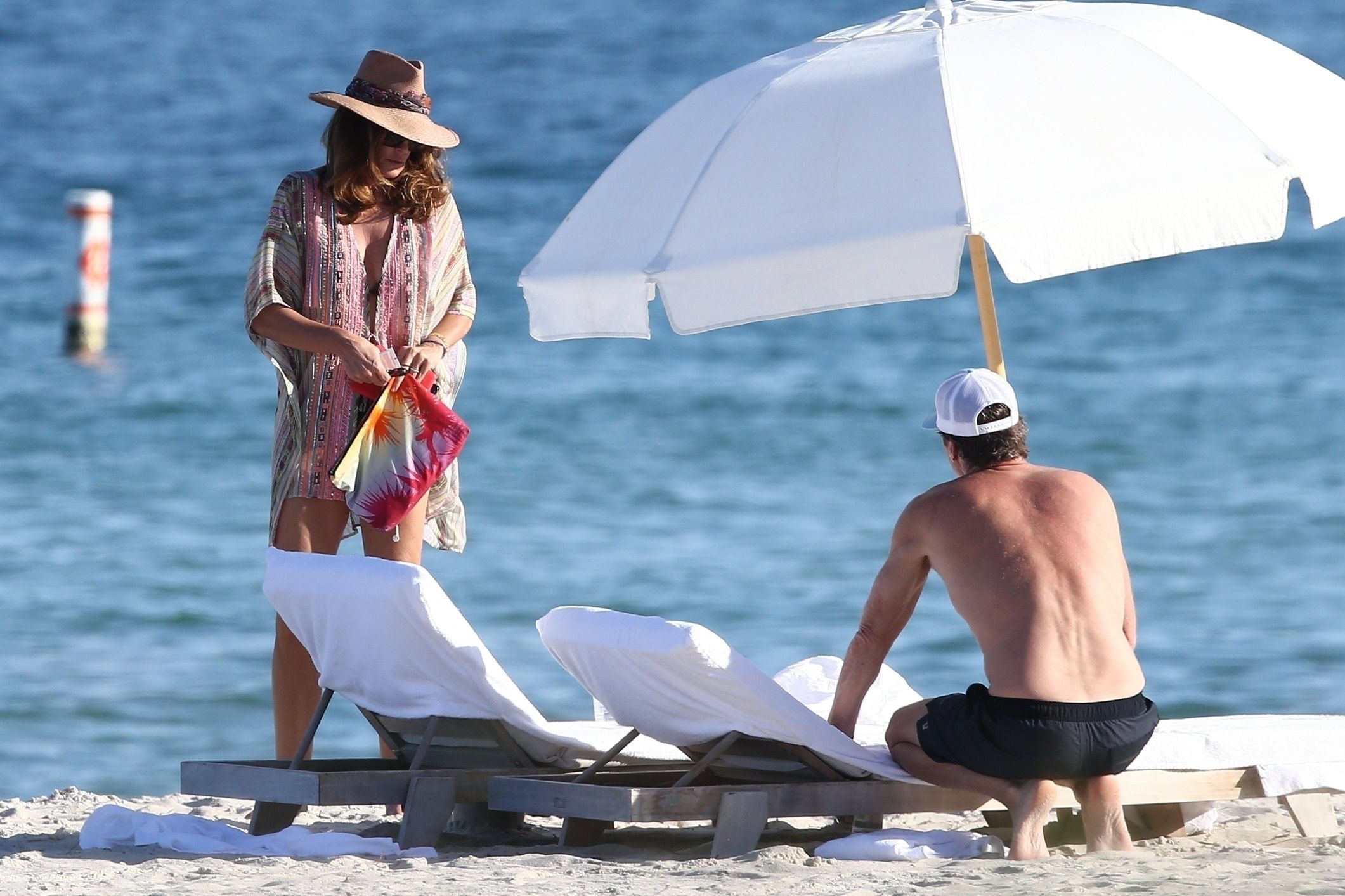 *PREMIUM EXCLUSIVE* Cindy Crawford and husband, Rande Gerber look relaxed as they hit the beach on New Year's Day in Miami. Supermodel Cindy, 53, looked stunning with a shawl over a green bikini, topping off her chic look with a straw fedora.
01 Jan 2020, Image: 490681548, License: Rights-managed, Restrictions: World Rights, Model Release: no, Credit line: BackGrid/MEGA / Mega Agency / Profimedia