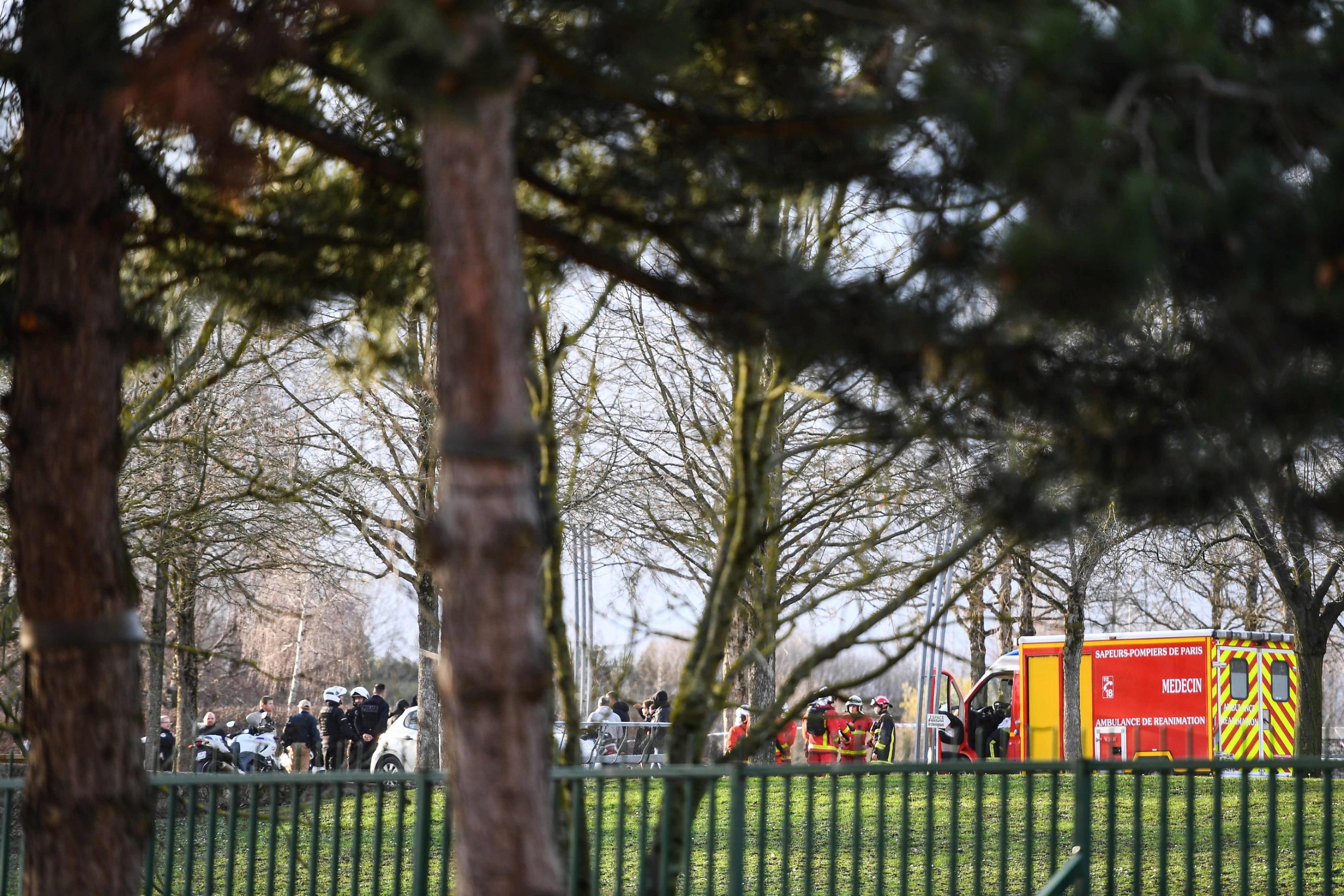 Police and firefighters gather in a park in the south of Paris' suburban city of Villejuif on January 3, 2020 where a man was shot and killed by officers after stabbing passers-by. - The man had attacked 