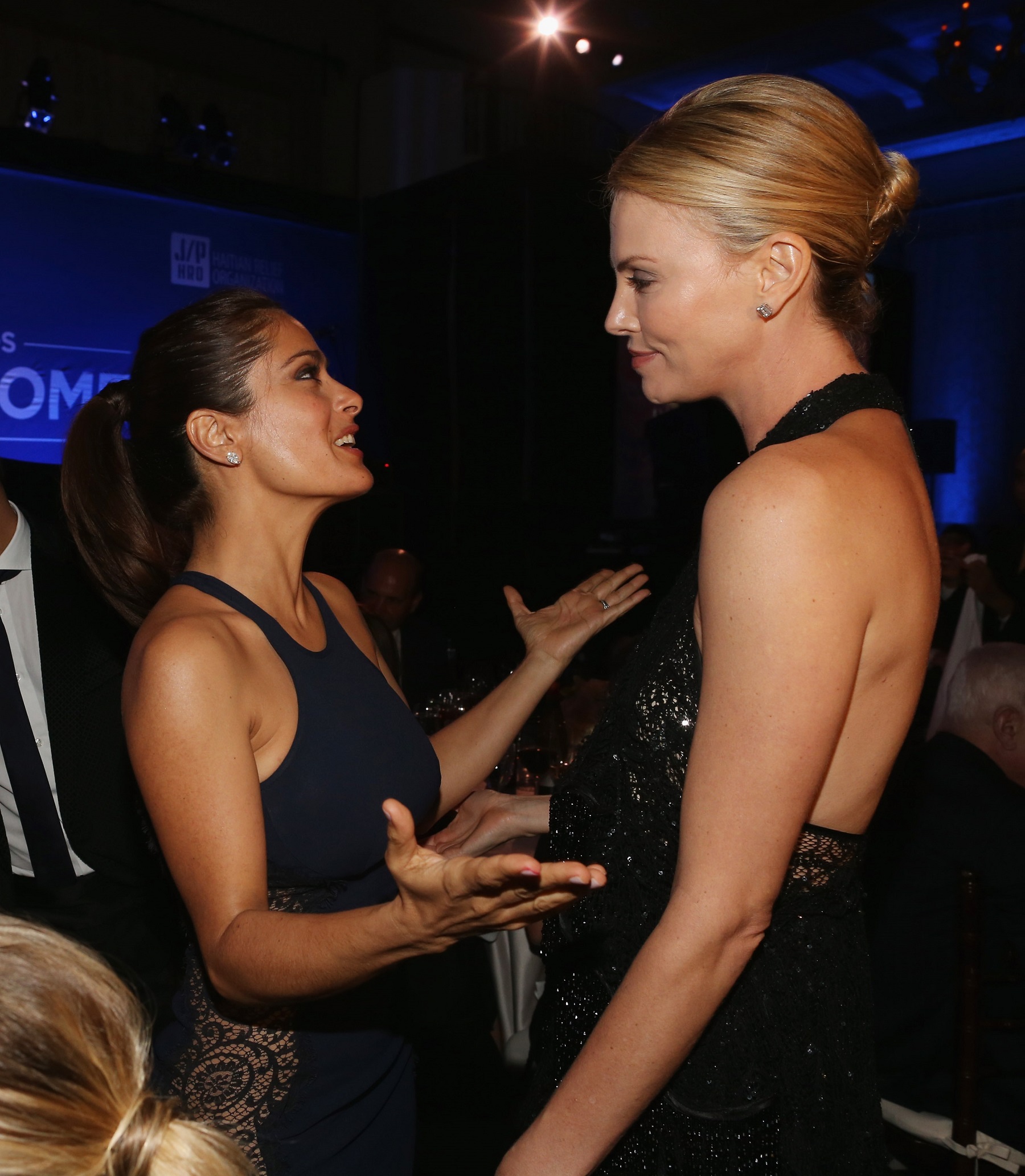 LOS ANGELES, CA - JANUARY 10:  Salma Hayek and Charlize Theron attend the 4th Annual Sean Penn & Friends HELP HAITI HOME Gala Benefiting J/P Haitian Relief Organization on January 10, 2015 in Los Angeles, California.  (Photo by Christopher Polk/Getty Images for J/P Haitian Relief Organization)