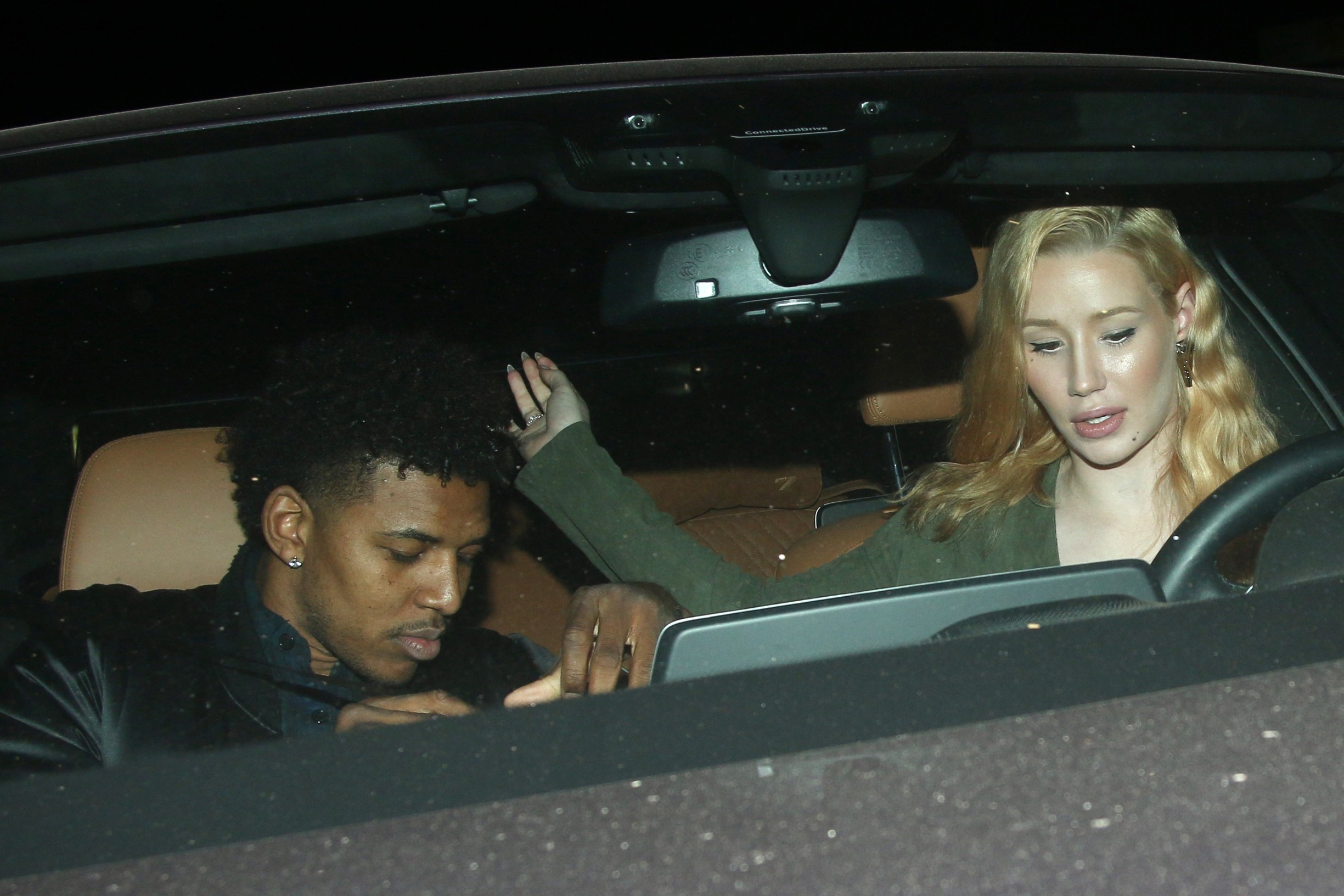 West Hollywood, CA - Iggy Azalea and her fiancĂ© Nick Young enjoyed a romantic evening together at The Nice Guy on Valentine's Day. Nick tweeted, 'Just tried to take a selfie with @IggyAzalea for V-day and her hair caught on fire on the candle!'.
         February 14, 2016, Image: 274120740, License: Rights-managed, Restrictions: NO Brazil,NO Brazil, Model Release: no, Credit line: AKM Images / Backgrid USA / Profimedia