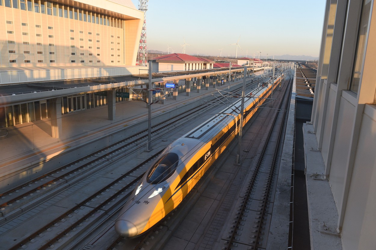 (191129) -- ZHANGJIAKOU, Nov. 29, 2019  -- A high-speed test train runs past the Huailai Station along the Beijing-Zhangjiakou high-speed railway in Zhangjiakou, north China's Hebei Province, Nov. 27, 2019. The construction of each station along the Beijing-Zhangjiakou high-speed railway is to be completed soon, following the operational test of each station., Image: 485498535, License: Rights-managed, Restrictions: WORLDWIDE RIGHTS AVAILABLE EXCLUDING CHINA, HONG KONG ONLY. End users shall not licence, sell, transmit, or otherwise distribute any photographs represented by eyevine, to any third party. Contact eyevine for more information: Tel: +44 (0) 20 8709 8709 Ema, Model Release: no, Credit line: Xinhua / Eyevine / Profimedia