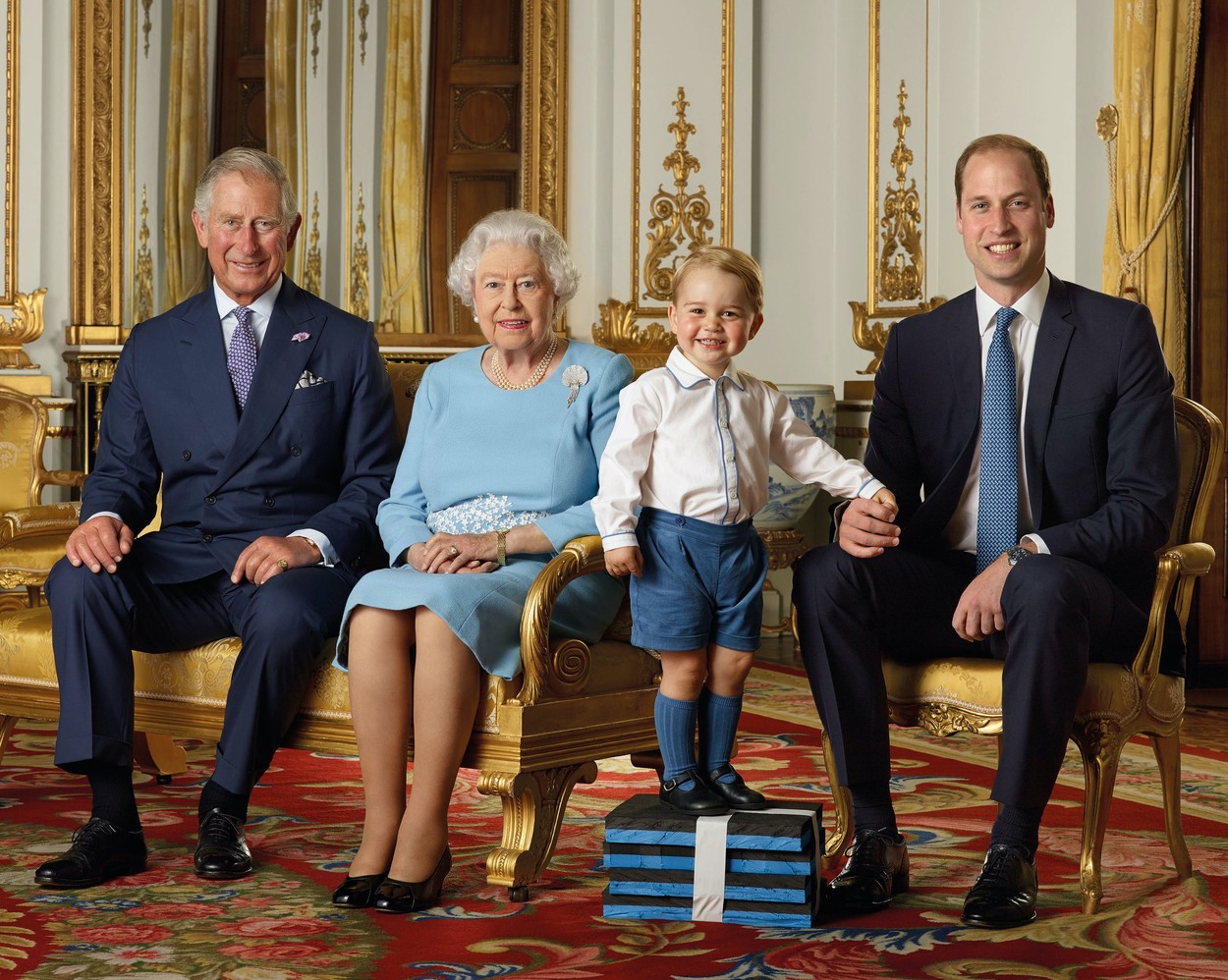 ONE USE ONLY. May only be used in conjunction with the release of the new royal family portrait by Ranald Mackechnie issued on January 4, 2020. 

File photo released in 2016 of Prince George standing on foam blocks during a Royal Mail photoshoot for a stamp sheet to mark the 90th birthday of Queen Elizabeth II. The sheet features four generations of the Royal family, from left, the Prince of Wales, Queen Elizabeth II, Prince George and the Duke of Cambridge, and the picture was taken in the summer of 2015 in the White Drawing Room at Buckingham Palace, London, UK, on the 4th January 2020.

Picture by Ranald Mackechnie/WPA-Pool

This photograph is solely for news editorial use only; no commercial use whatsoever of the photograph (including any use in merchandising, advertising or any other non-editorial use); not for use after 15th January 2020 without prior permission from Royal Communications. The photograph must not be digitally enhanced, manipulated or modified in any manner or form and must include all of the individuals in the photograph when published. 

NOTE TO EDITORS: This handout photo may only be used in for editorial reporting purposes for the contemporaneous illustration of events, things or the people in the image or facts mentioned in the caption. Reuse of the picture may require further permission from the copyright holder.
04 Jan 2020, Image: 490929150, License: Rights-managed, Restrictions: NO United Kingdom, Model Release: no, Credit line: MEGA / Mega Agency / Profimedia