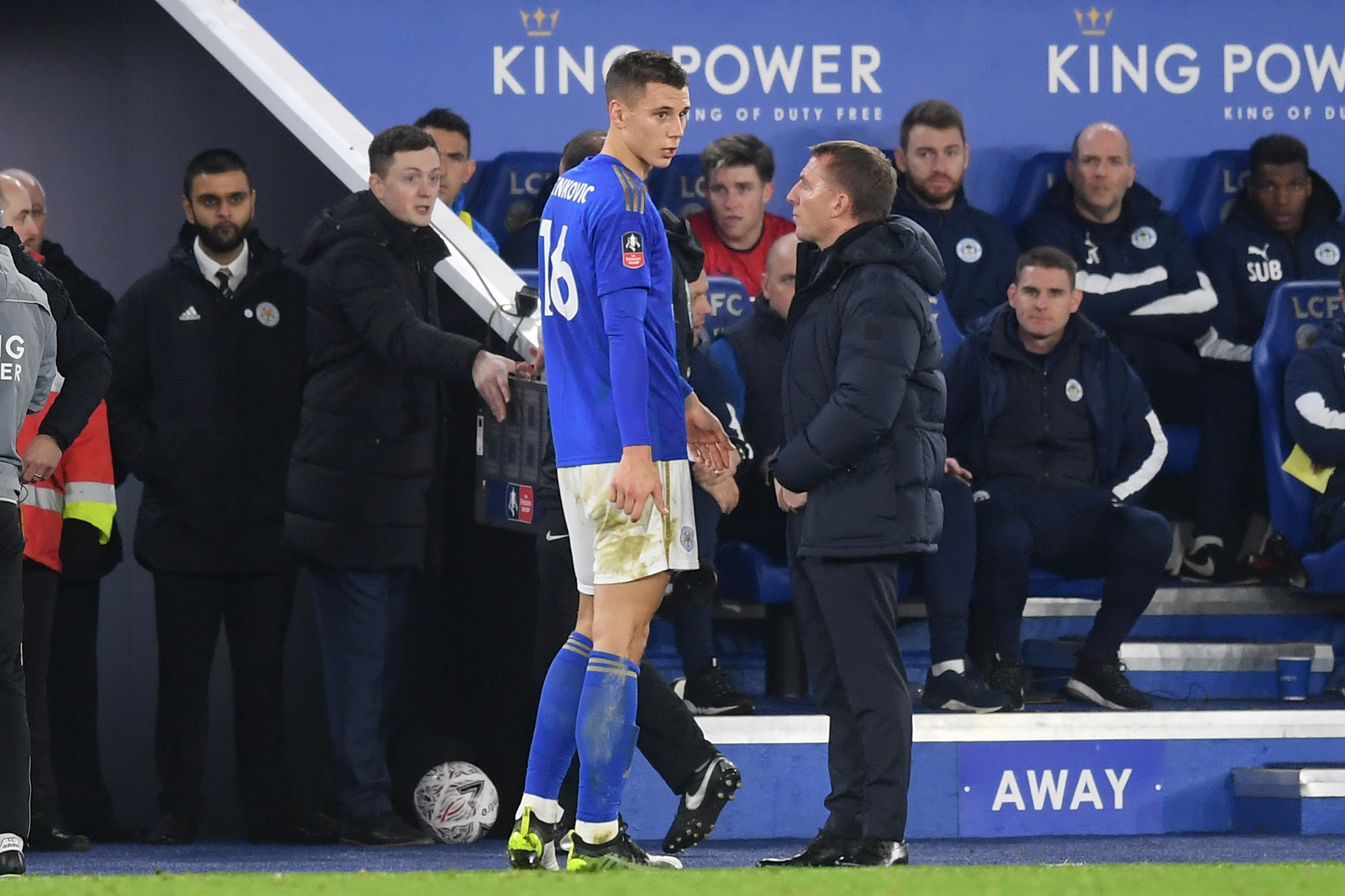 LEICESTER, ENGLAND - JANUARY 04: Filip Benkovic of Leicester City speaks to Brendan Rodgers, Manager of Leicester City as he is substituted off during the FA Cup Third Round match between Leicester City and Wigan Athletic at The King Power Stadium on January 04, 2020 in Leicester, England. (Photo by Michael Regan/Getty Images)