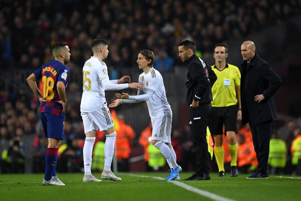 BARCELONA, SPAIN - DECEMBER 18:  Luka Modric of Real Madrid replaces Federico Valverde of Real Madrid during the Liga match between FC Barcelona and Real Madrid CF at Camp Nou on December 18, 2019 in Barcelona, Spain. (Photo by Alex Caparros/Getty Images)