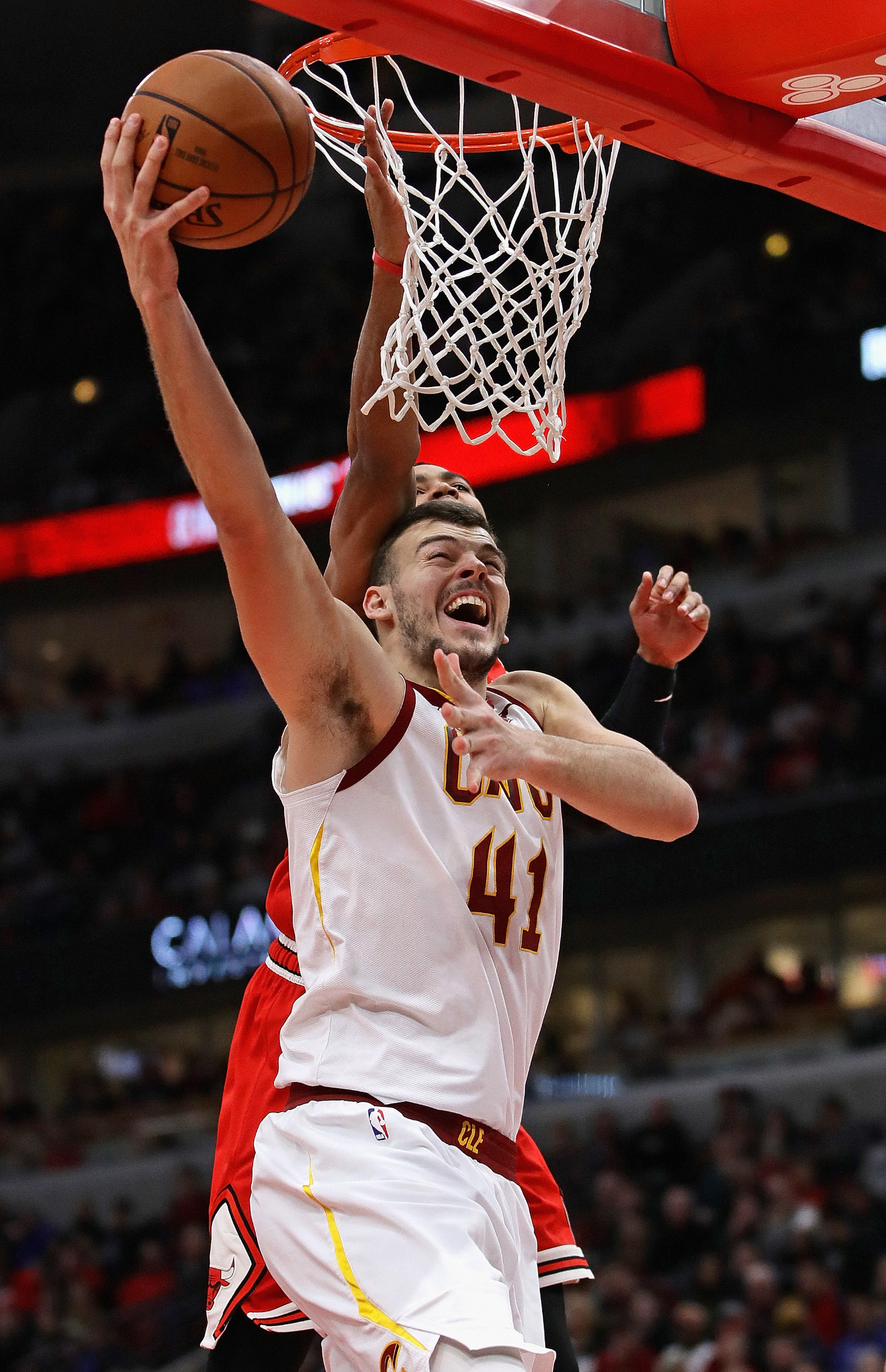CHICAGO, ILLINOIS - JANUARY 27: Ante Zizic #41 of the Cleveland Cavaliers puts up a shot in front of Shaquille Harrison #3 of the Chicago Bulls at the United Center on January 27, 2019 in Chicago, Illinois. The Cavaliers defeated the Bulls 104-101. NOTE TO USER: User expressly acknowledges and agrees that, by downloading and or using this photograph, User is consenting to the terms and conditions of the Getty Images License Agreement. (Photo by Jonathan Daniel/Getty Images)