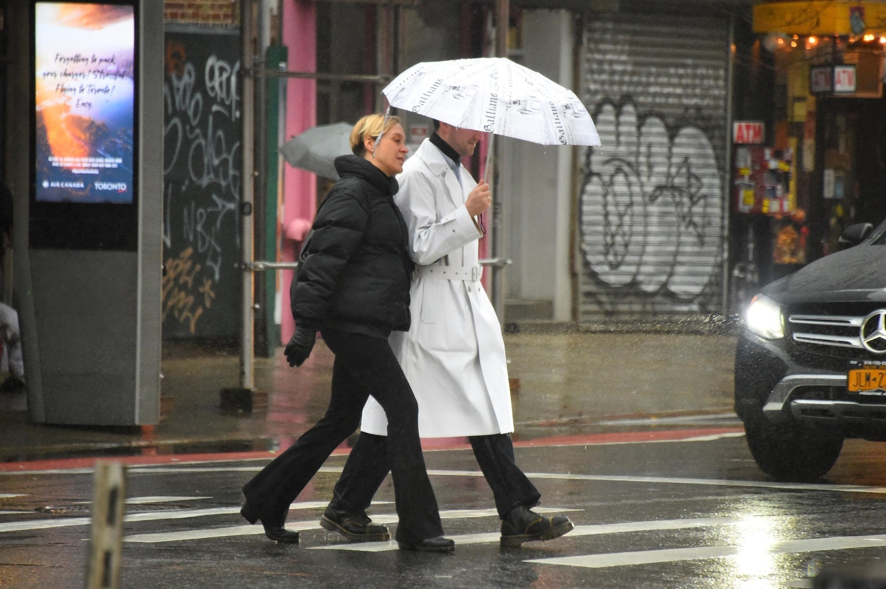New York, NY  - *EXCLUSIVE*  - Chloe Sevigny and her boyfriend Sinisa Mackovic are seen out in Manhattan. The duo crowd under an umbrella as they brave the rain together.

BACKGRID USA 30 DECEMBER 2019, Image: 490417394, License: Rights-managed, Restrictions: , Model Release: no, Credit line: JosiahW / BACKGRID / Backgrid USA / Profimedia
