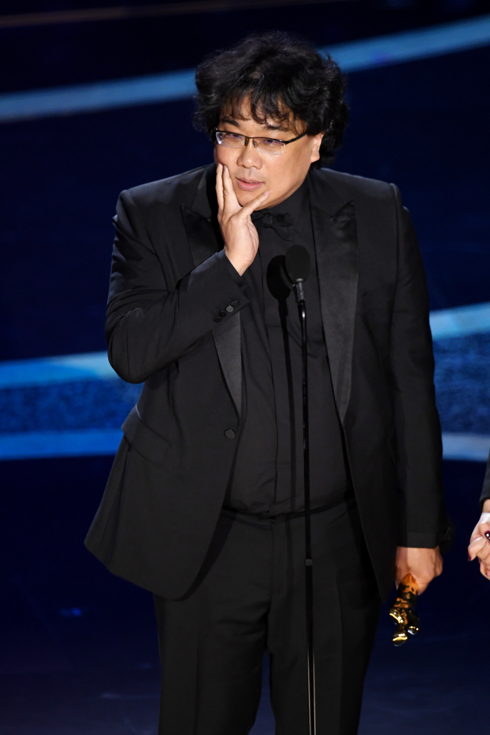 HOLLYWOOD, CALIFORNIA - FEBRUARY 09: Bong Joon-ho accepts the Directing award for 'Parasite' onstage during the 92nd Annual Academy Awards at Dolby Theatre on February 09, 2020 in Hollywood, California. (Photo by Kevin Winter/Getty Images)