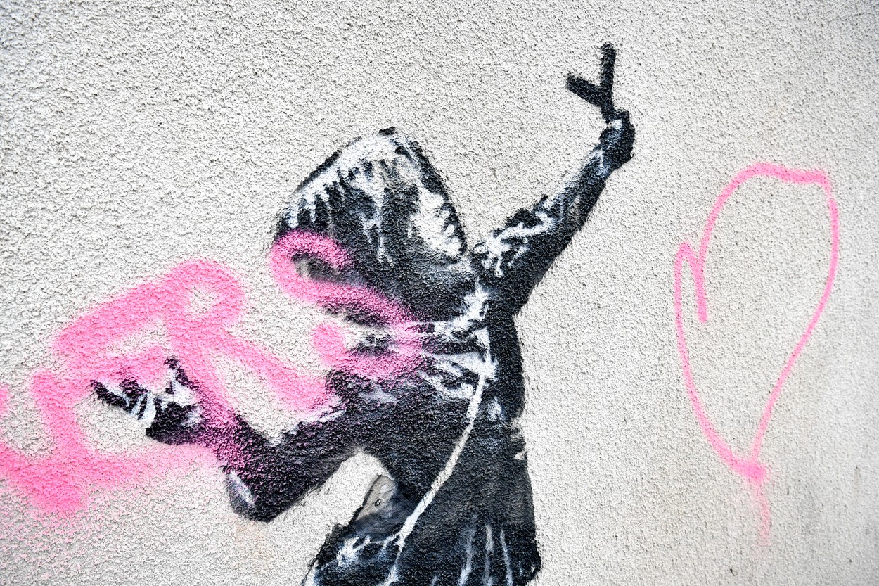 A Banksy work of art on the side of a house on Marsh Lane, Barton Hill, Bristol, which has been vandalised with pink spray paint, the day after it was confirmed on Valentine's Day., Image: 498737844, License: Rights-managed, Restrictions: , Model Release: no, Credit line: Ben Birchall / PA Images / Profimedia