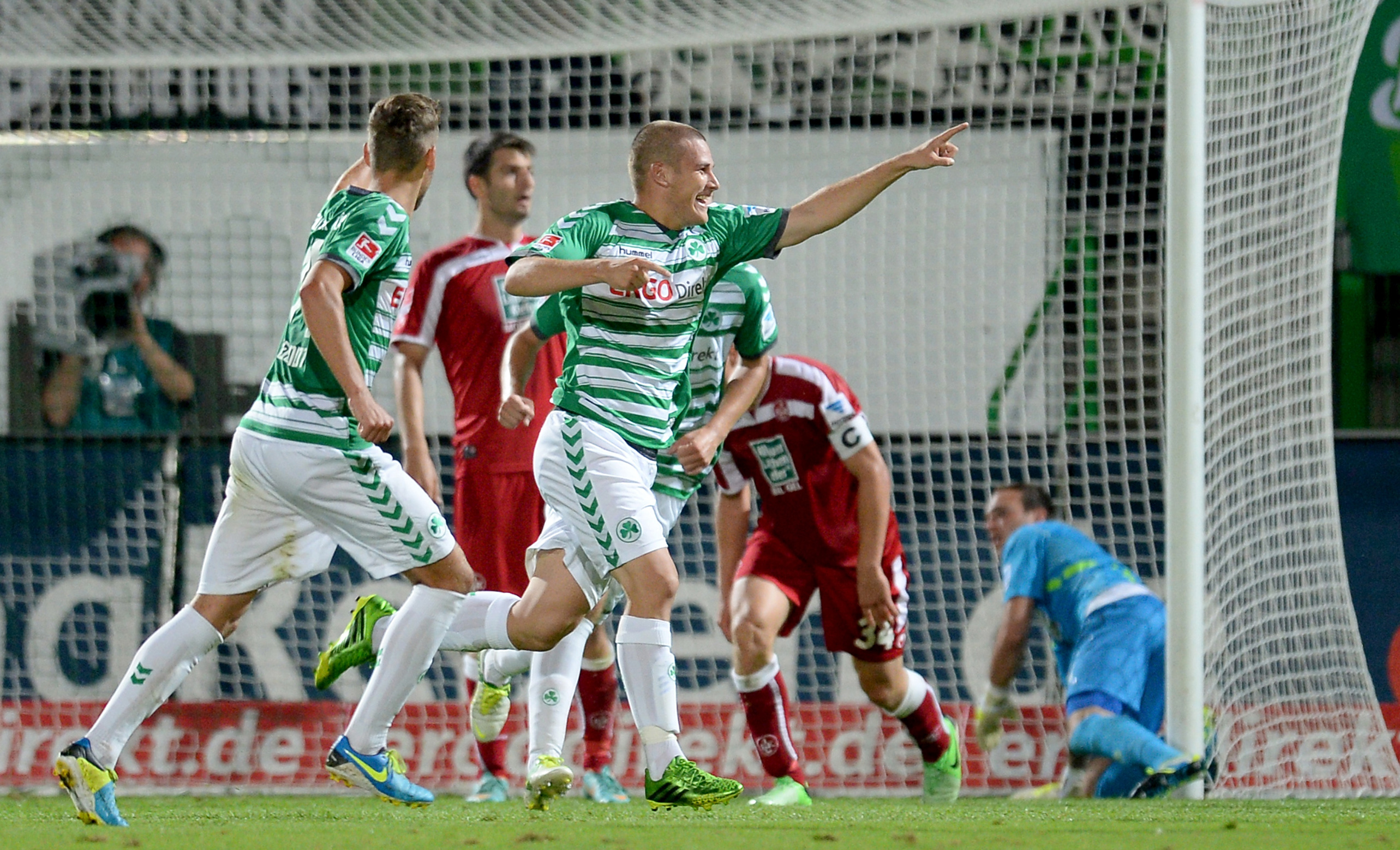 FUERTH, GERMANY - AUGUST 12:  Ognjen Mudrinski (C) of Fuerth celebrates after scoring his team's second goal during the second Bundesliga match between SpVgg Greuther Fuerth and 1. FC Kaiserslautern at Trolli-Arena on August 12, 2013 in Fuerth, Germany.  (Photo by Micha Will/Bongarts/Getty Images)