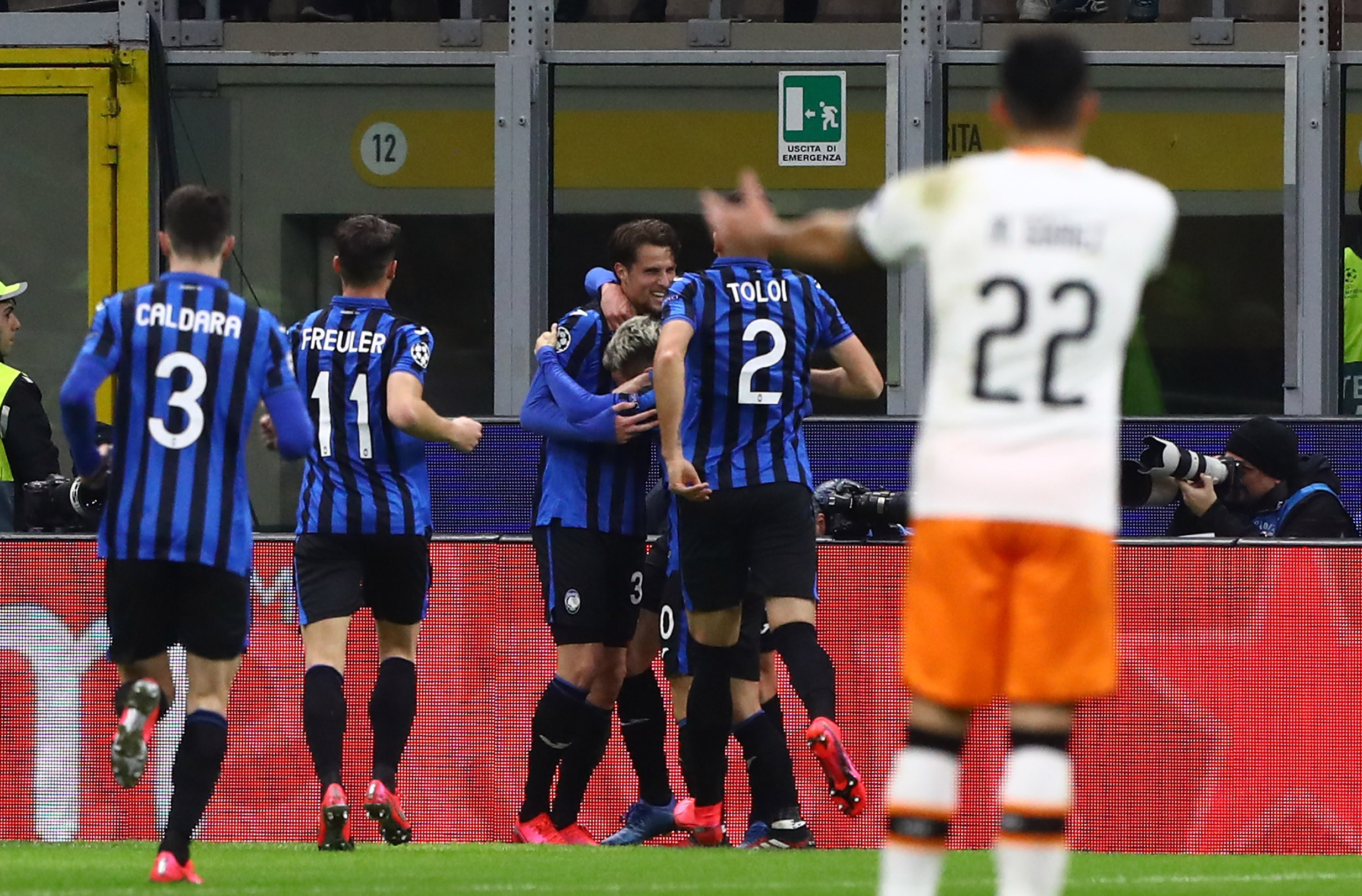 MILAN, ITALY - FEBRUARY 19:  Hans Hateboer of Atalanta celebrates with his team-mates after scoring the opening goal during the UEFA Champions League round of 16 first leg match between Atalanta and Valencia CF at San Siro Stadium on February 19, 2020 in Milan, Italy.  (Photo by Marco Luzzani/Getty Images)