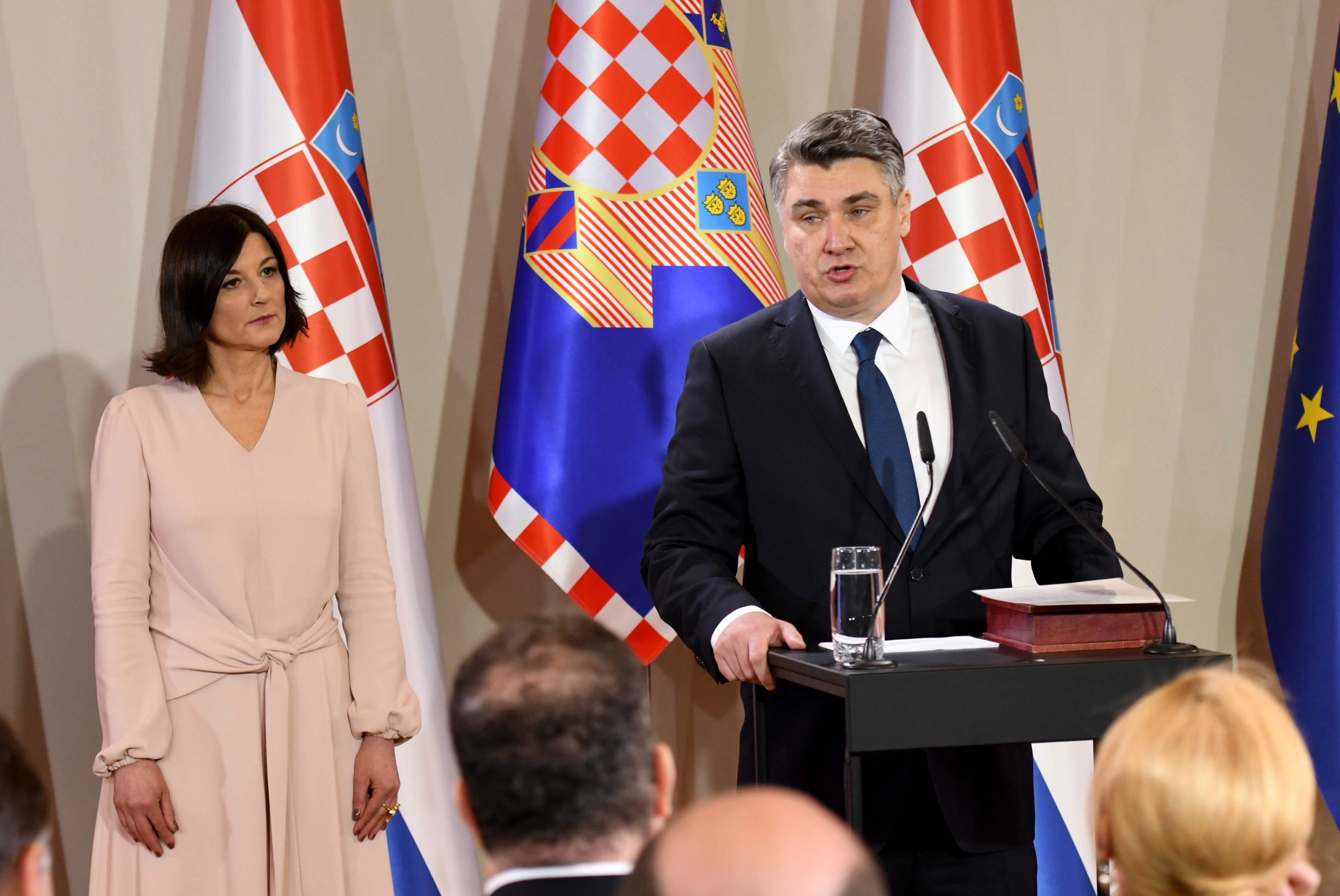 New Croatian President Zoran Milanovic delivers a speech flanked by his wife Sanja Music Milanovic