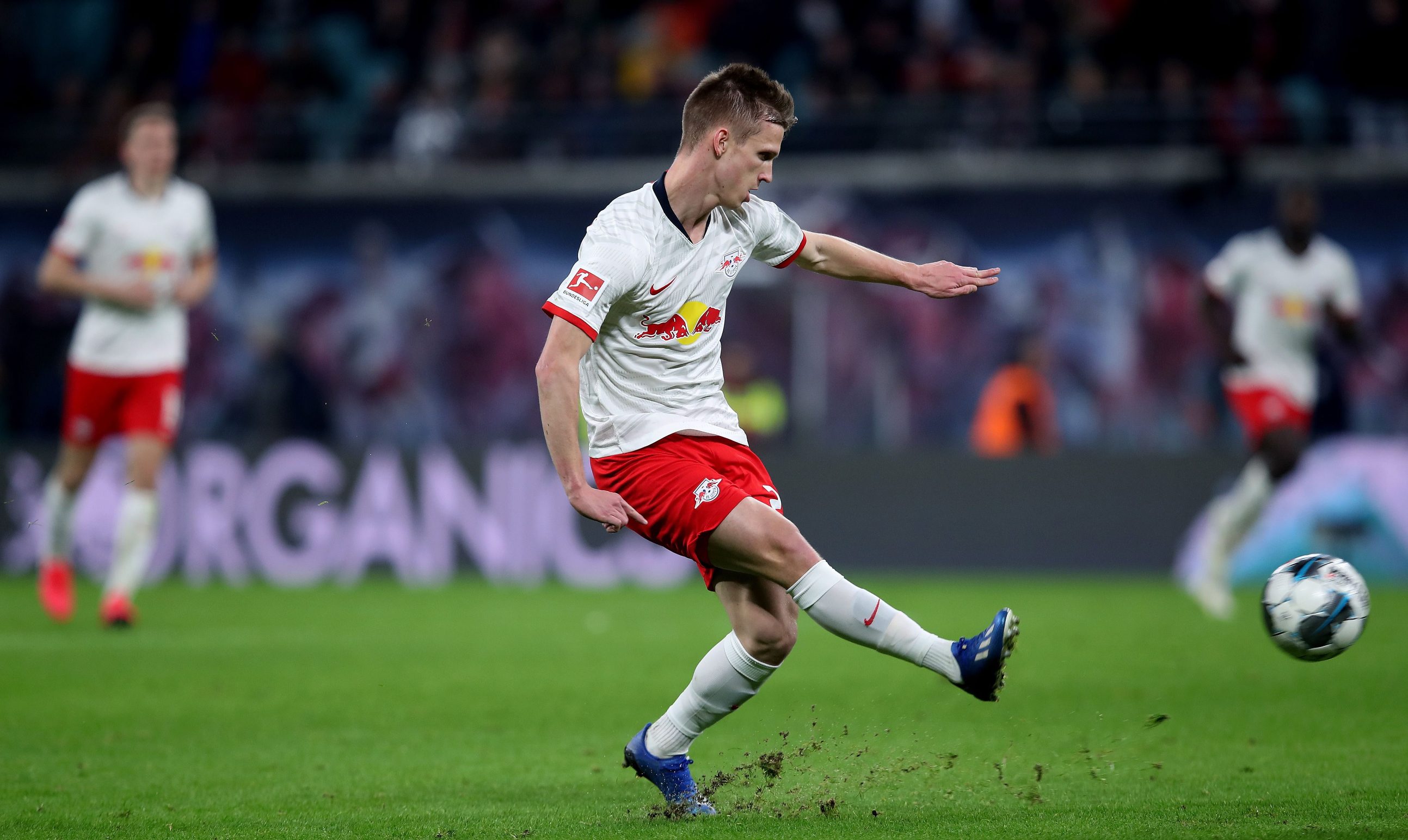 Leipzig's Spain midfielder Dani Olmo kicks the ball during the German first division Bundesliga football match RB Leipzig v Borussia Moenchengladbach in Leipzig on February 1, 2020. (Photo by Ronny Hartmann / AFP) / RESTRICTIONS: DFL REGULATIONS PROHIBIT ANY USE OF PHOTOGRAPHS AS IMAGE SEQUENCES AND/OR QUASI-VIDEO