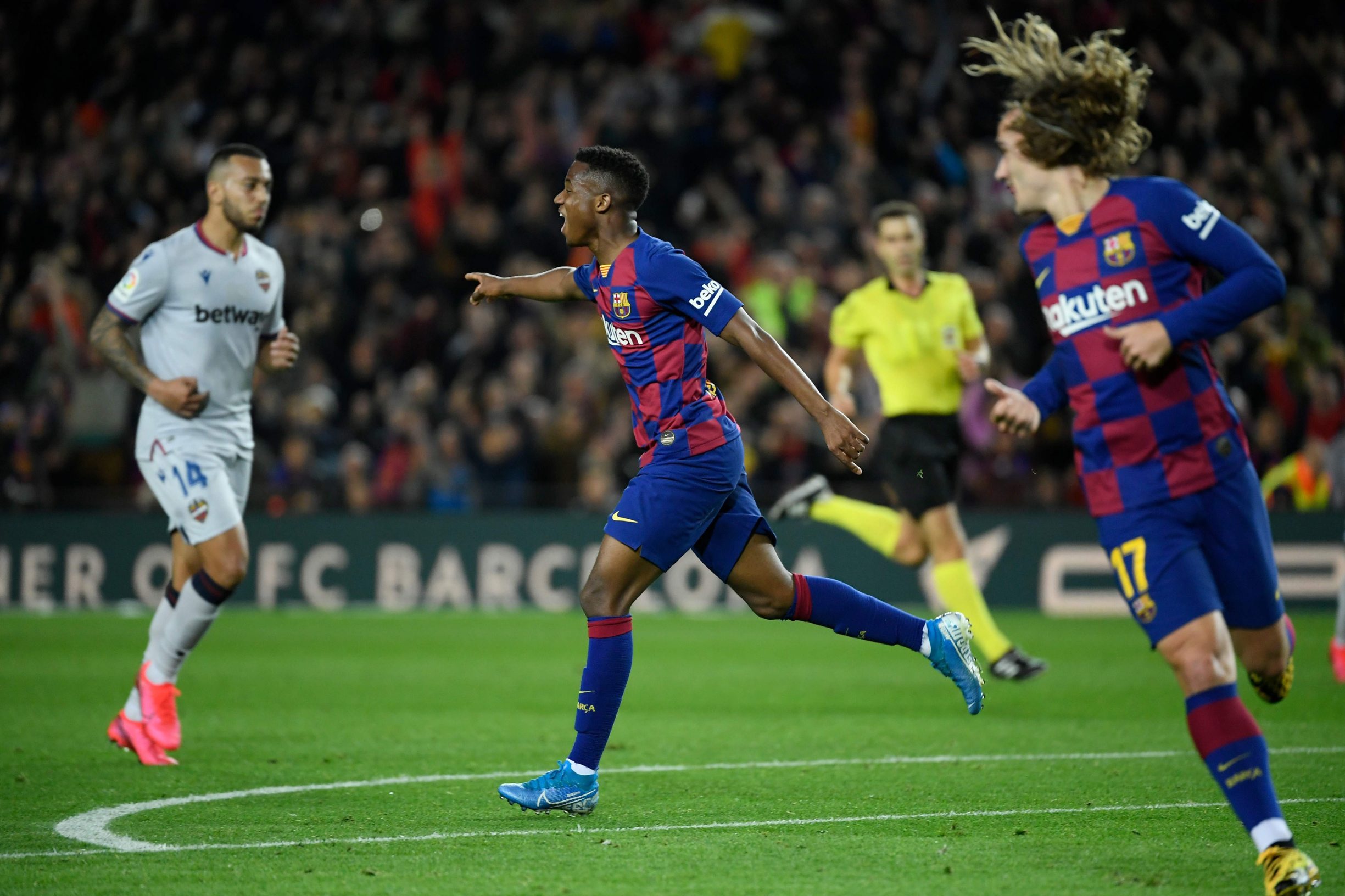Barcelona's Guinea-Bissau forward Ansu Fati celebrates after scoring during the Spanish league football match be tween FC Barcelona and Levante UD at the Camp Nou stadium in Barcelona, on February 2, 2020. (Photo by LLUIS GENE / AFP)