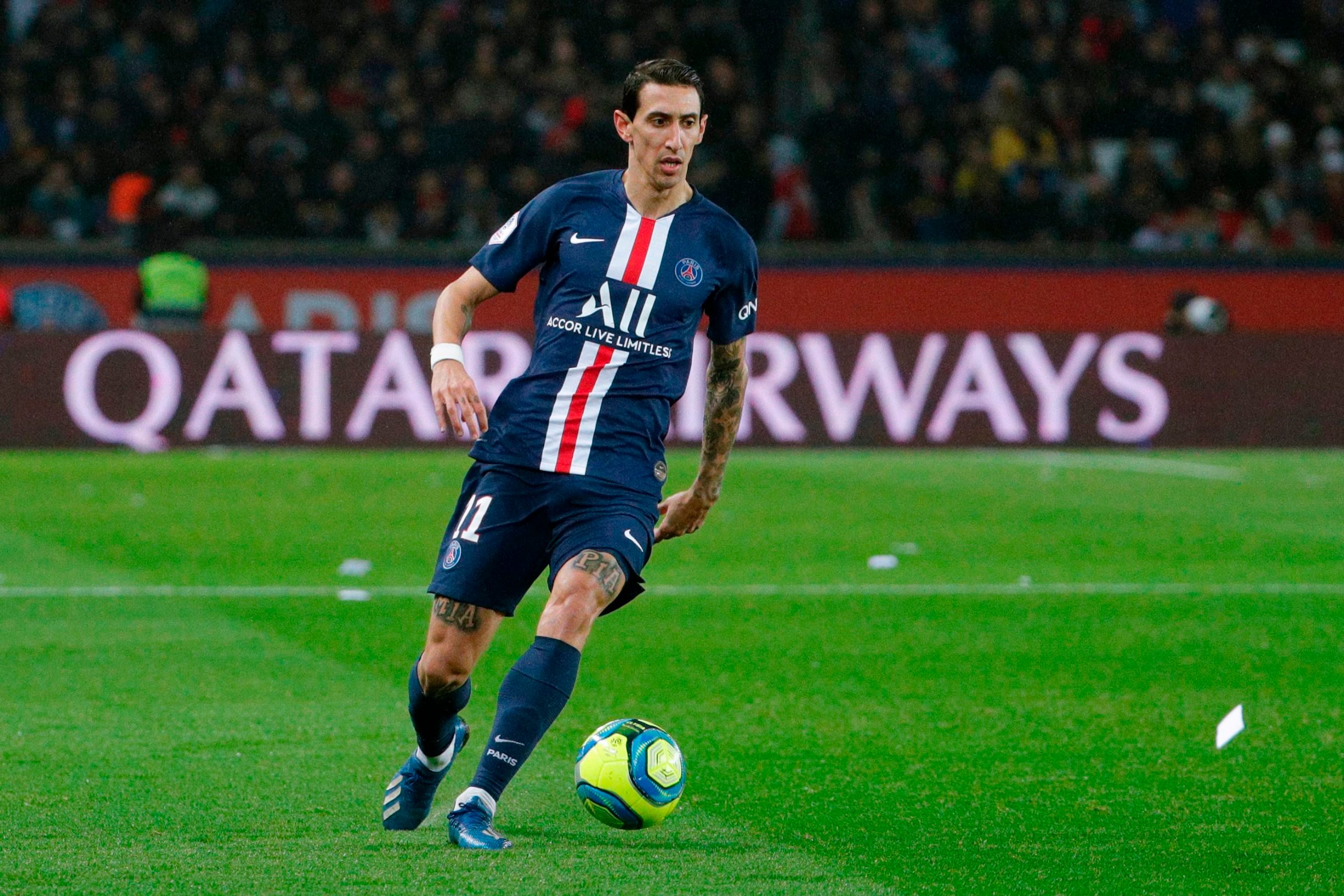 Paris Saint-Germain's Argentine midfielder Angel Di Maria plays the ball during the French L1 football match Paris Saint-Germain (PSG) against Lyon (OL) at the Parc des Princes stadium in Paris, on February 9, 2020. (Photo by GEOFFROY VAN DER HASSELT / AFP)