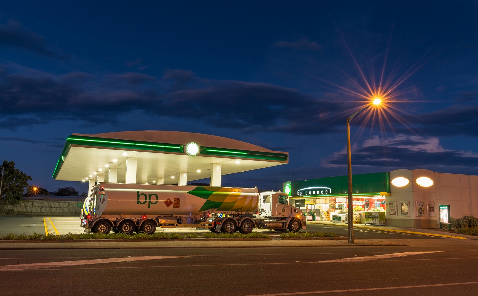 Tanker truck in front of petrol station with street lighting at night, Otago, South Island, New Zealand, Image: 471274035, License: Rights-managed, Restrictions: , Model Release: no, Credit line: Gerhard Zwerger-Schoner / imageBROKER / Profimedia