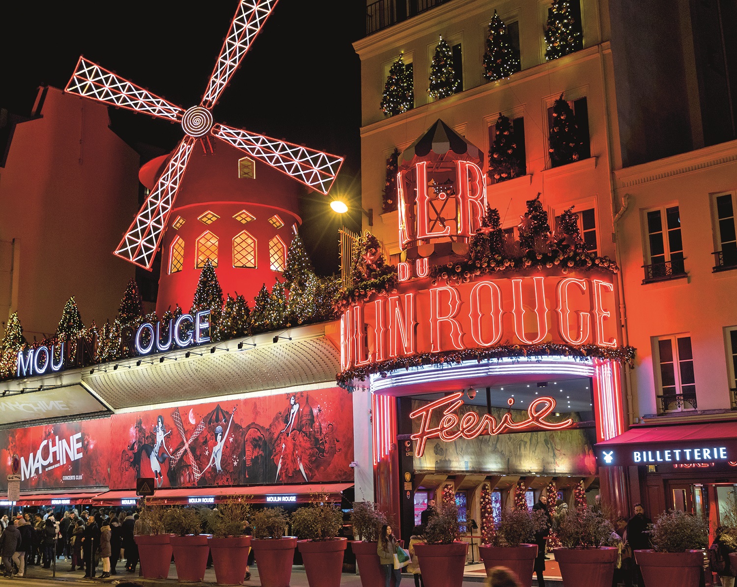 PARIS, FRANCE - DECEMBER 30: Moulin Rouge on December 30, 2019 in Paris, France. Moulin Rouge is a cabaret in Paris. The original house, which burned down in 1915, was co-founded in 1889 by Charles Zidler and Joseph Oller. Moulin Rouge is best known as the birthplace of the modern form of the can-can dance. Moulin Rouge is a tourist attraction, offering musical dance entertainment. (Photo by Athanasios Gioumpasis/Getty Images)