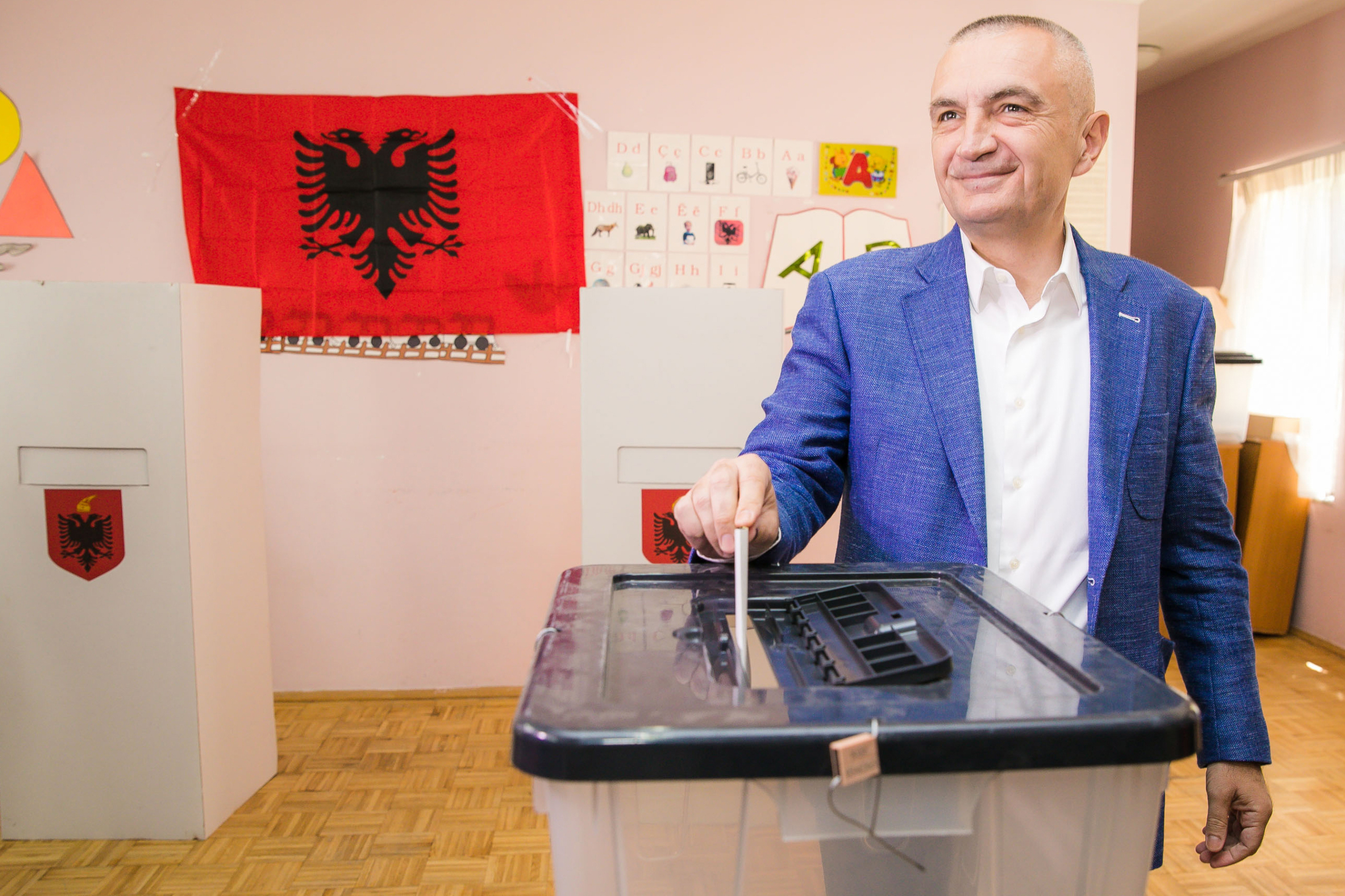 Albania's Socialist Movement for Integration (LSI) party's founder and newly elected President Ilir Meta, casts his ballot at a polling station in Tirana, during a parliamentary election on June 25, 2017. - Albania votes in a parliamentary election with Socialist Prime Minister Edi Rama hoping to boost his grip on power and lead the Balkan country into talks on European Union accession. (Photo by STRINGER / AFP)
