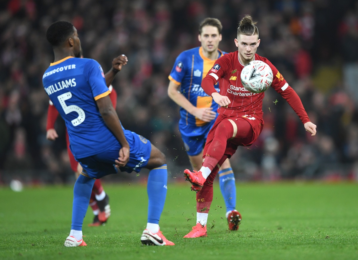 LIVERPOOL, ENGLAND - FEBRUARY 04: Harvey Elliott of Liverpool is challenged by Ro-Shaun Williams of Shrewsbury Town during the FA Cup Fourth Round Replay match between Liverpool FC and Shrewsbury Town at Anfield on February 04, 2020 in Liverpool, England. (Photo by Gareth Copley/Getty Images)