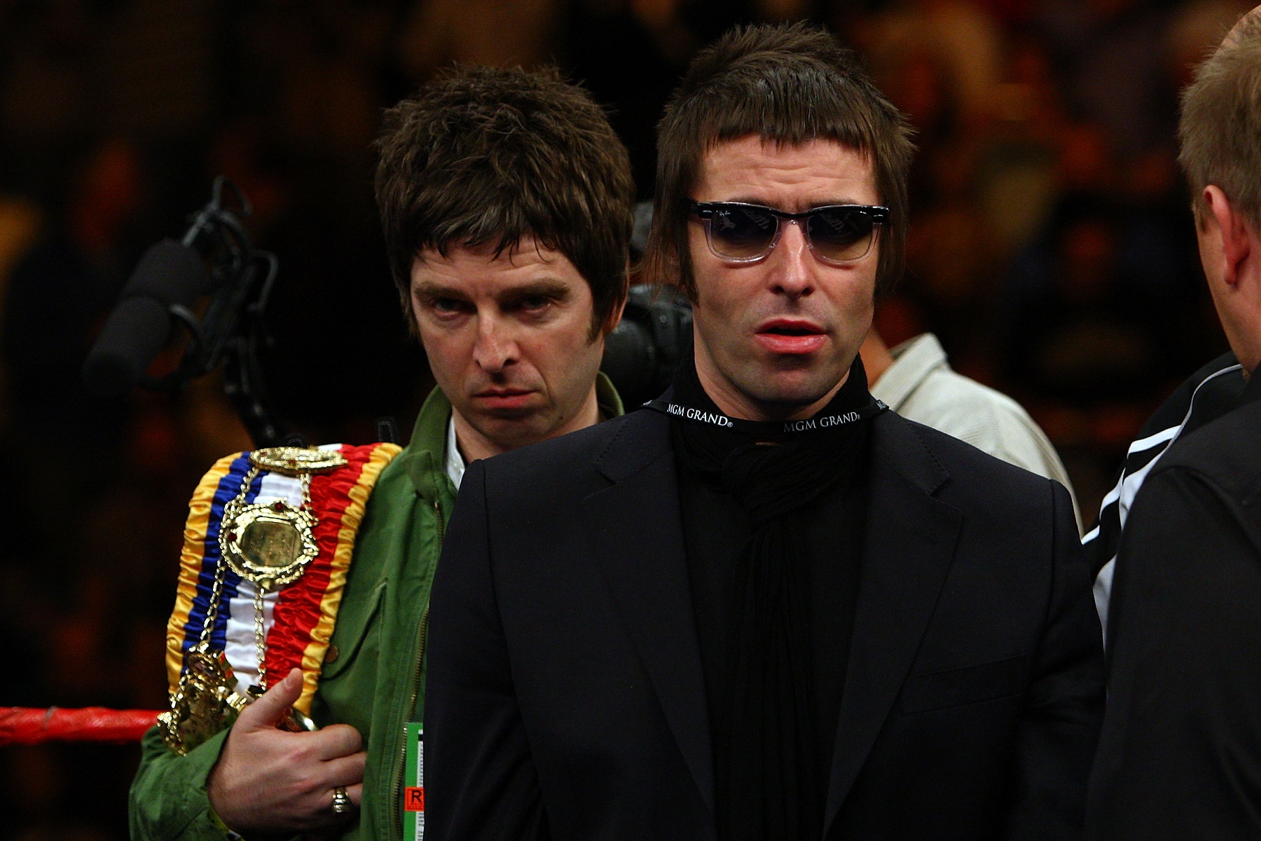 LAS VEGAS - NOVEMBER 22:  Noel and Liam Gallagher of Oasis bring out boxer Ricky Hatton of England's belts before taking on Paulie Malignaggi during their light-welterweight fight at the MGM Grand Garden Arena November 22, 2008 in Las Vegas, Nevada.  (Photo by John Gichigi/Getty Images)