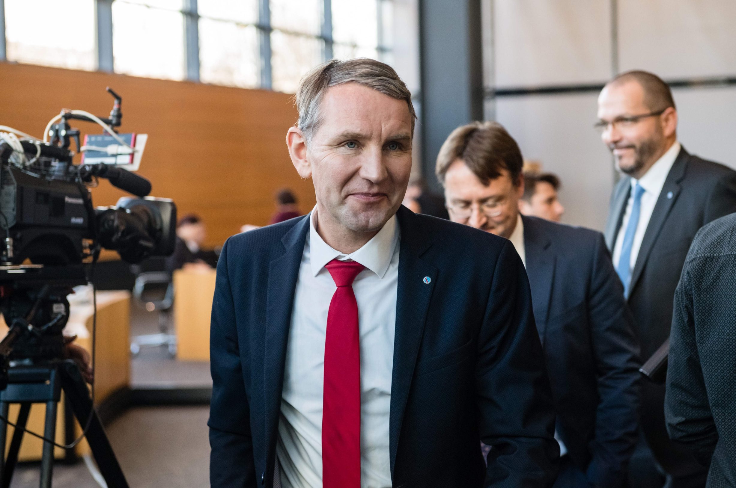 The Chairman of far-right AfD party parliamentary group in Thuringia Bjoern Hoecke is seen in the Thuringian state parliament in Erfurt, eastern Germany, prior to the elections of Thuringia's Prime Minister on February 05, 2020. - The tiny central state of Thuringia broke a German political taboo when a candidate for the regional premiership was unexpectedly heaved into office with  the help from the far-right AfD party. Thomas Kemmerich, a politician from the economically liberal Free Democratic Party (FDP), scored 45 votes, leapfrogging incumbent Bodo Ramelow of the Left party by one vote. (Photo by JENS SCHLUETER / AFP)