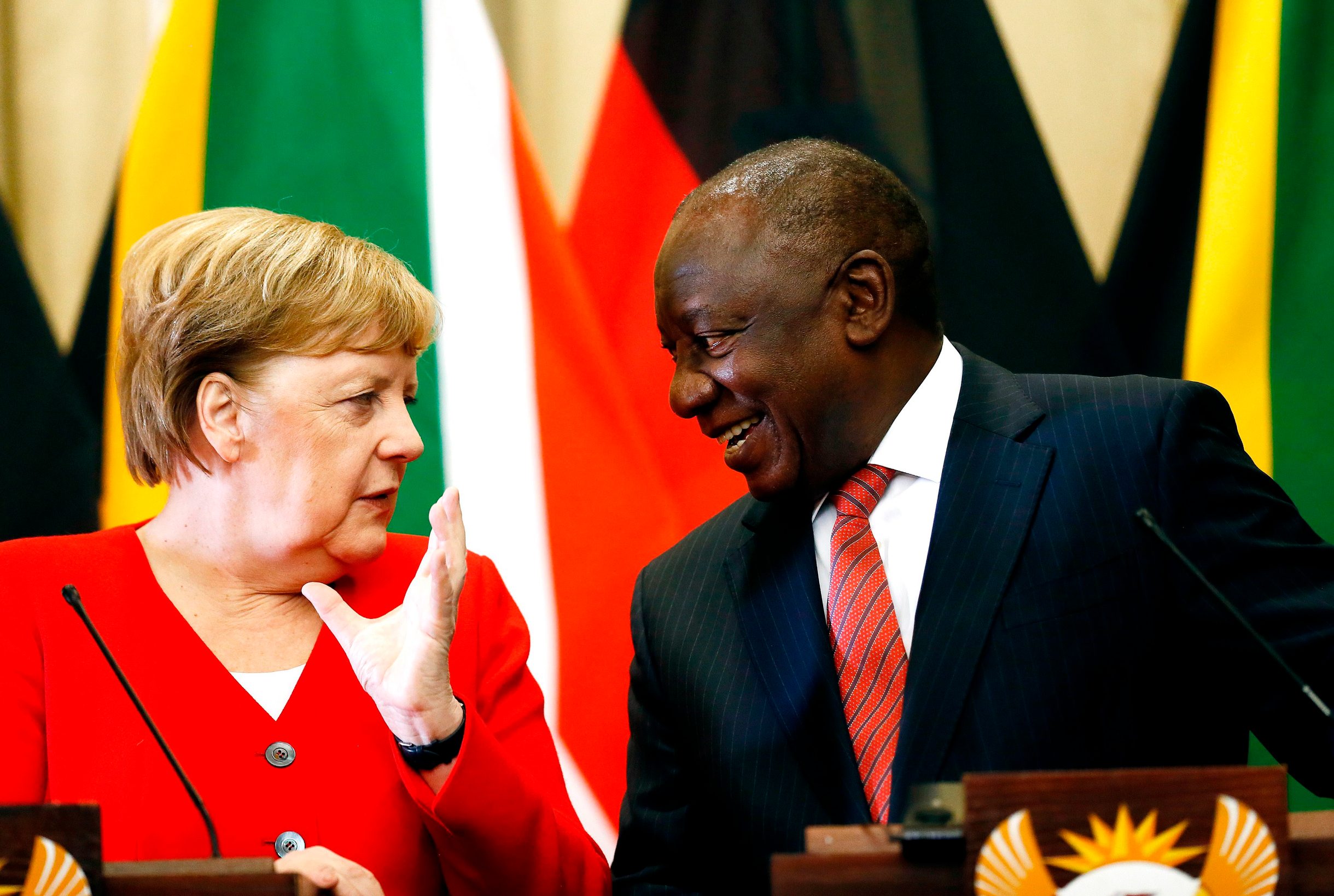 Angela Merkel (L), Chancellor of Germany, and Cyril Ramaphosa (R), the President of South Africa, conduct a joint press conference during her official visit at the Union Buildings in Pretoria on February 6, 2020. (Photo by Phill Magakoe / AFP)