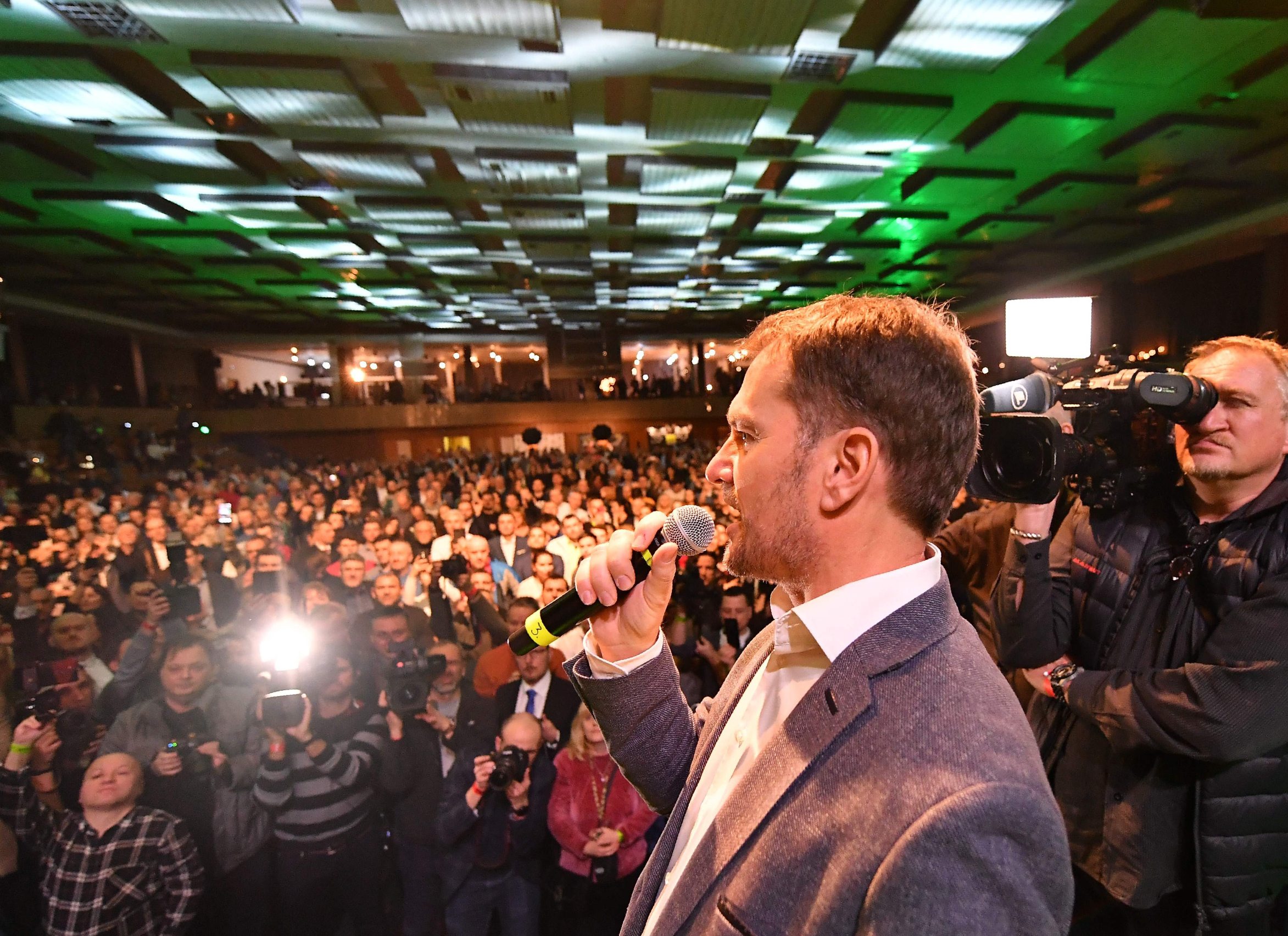 Igor Matovic, leader of the anti-graft political movement Ordinary People and Independent Personalities (OLaNO), speaks to supporters during the party's parliamentary election evening in Trnava, Slovakia on February 29, 2020. - Slovak voters handed a resounding victory to the centre-right, anti-graft OLaNO opposition party in Saturday's general election dominated by public anger over the 2018 murder of a journalist probing corruption, according to an exit poll. (Photo by JOE KLAMAR / AFP)