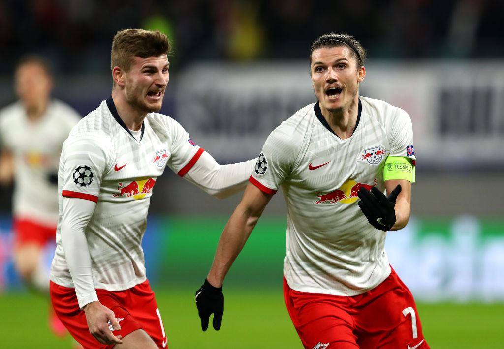 LEIPZIG, GERMANY - MARCH 10: Marcel Sabitzer of RB Leipzig celebrates with Timo Werner of RB Leipzig (left) after scoring his sides first goal during the UEFA Champions League round of 16 second leg match between RB Leipzig and Tottenham Hotspur at Red Bull Arena on March 10, 2020 in Leipzig, Germany. (Photo by Martin Rose/Bongarts/Getty Images)