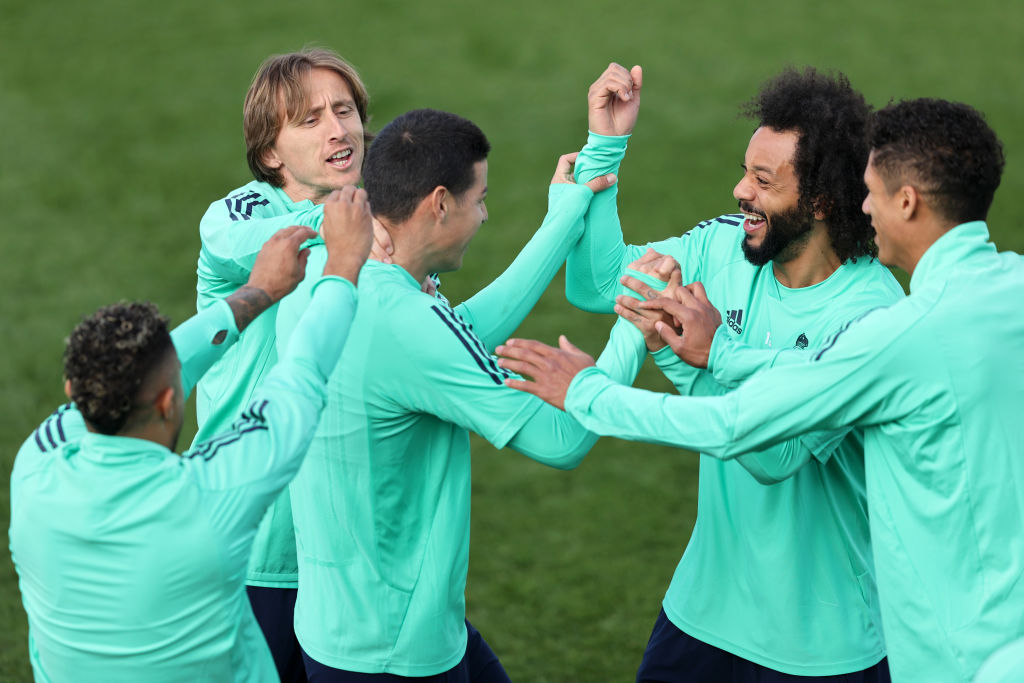 MADRID, SPAIN - FEBRUARY 25: James Rodriguez, Marcelo and Luka Modric share a joke during a training session ahead of their UEFA Champions League round of 16 first leg match against Manchester City at Valdebebas training ground on February 25, 2020 in Madrid, Spain. (Photo by Angel Martinez/Getty Images)