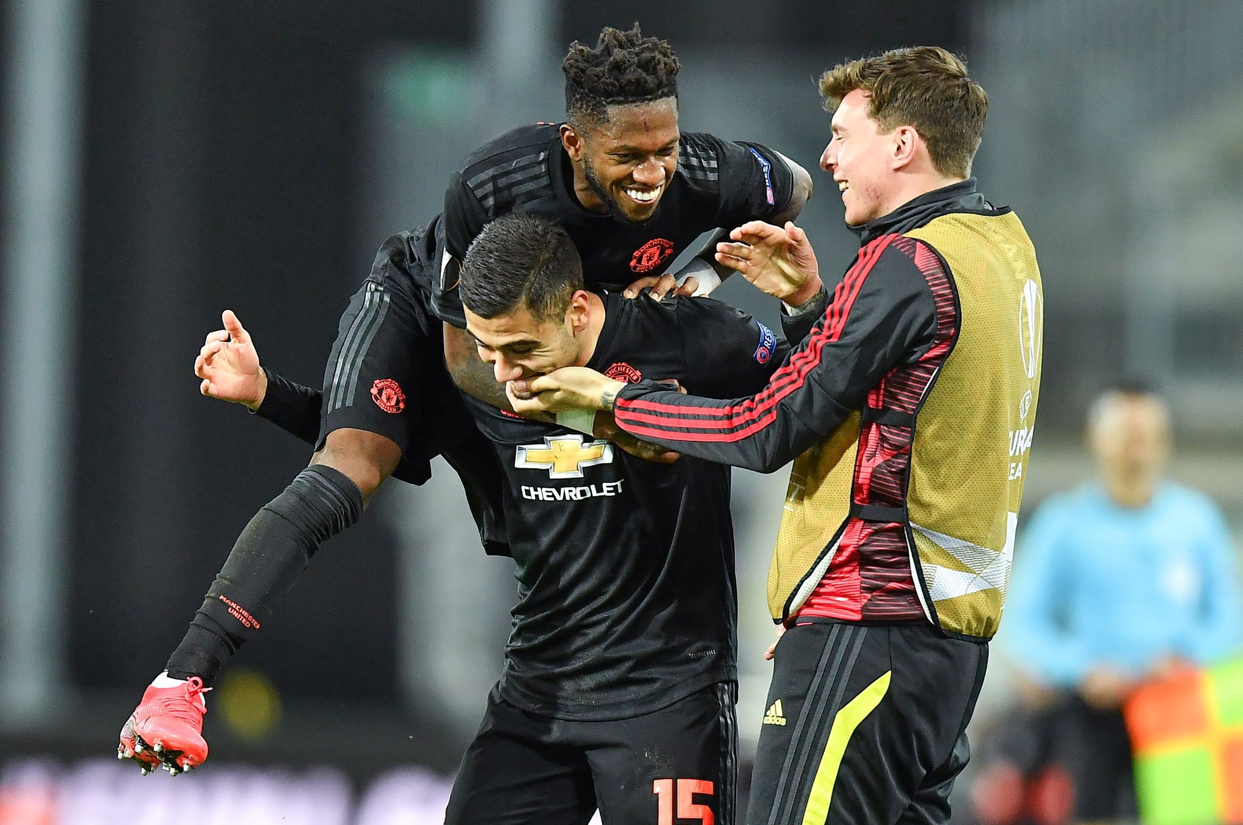 Manchester United's Belgian-born Brazilian midfielder Andreas Pereira (C) celebrates scoring with his team-mates during the UEFA Europa League last 16, first leg football match Linzer ASK (LASK) v Manchester United in Linz, Austria, on March 12, 2020. - The match is being held behind closed doors due to the new coronavirus COVID-19. (Photo by JOE KLAMAR / AFP)
