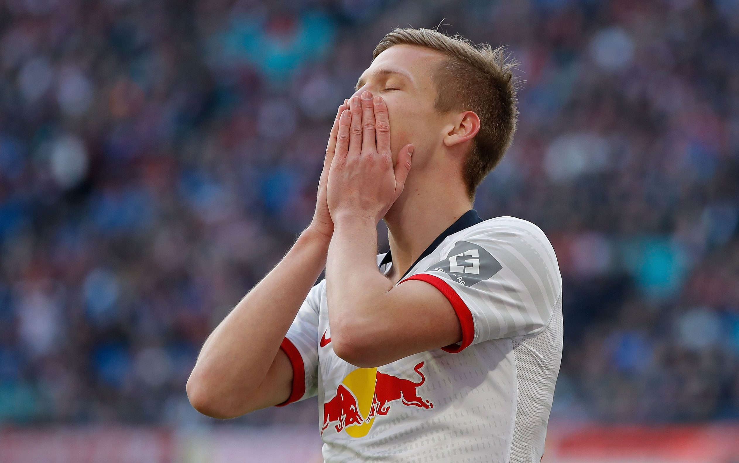 Leipzig's Spanish midfielder Dani Olmo reacts to a missed chance on goal during the German first division Bundesliga football match RB Leipzig vs SV Werder Bremen, in Leipzig, eastern Germany on February 15, 2020. (Photo by Odd ANDERSEN / AFP)