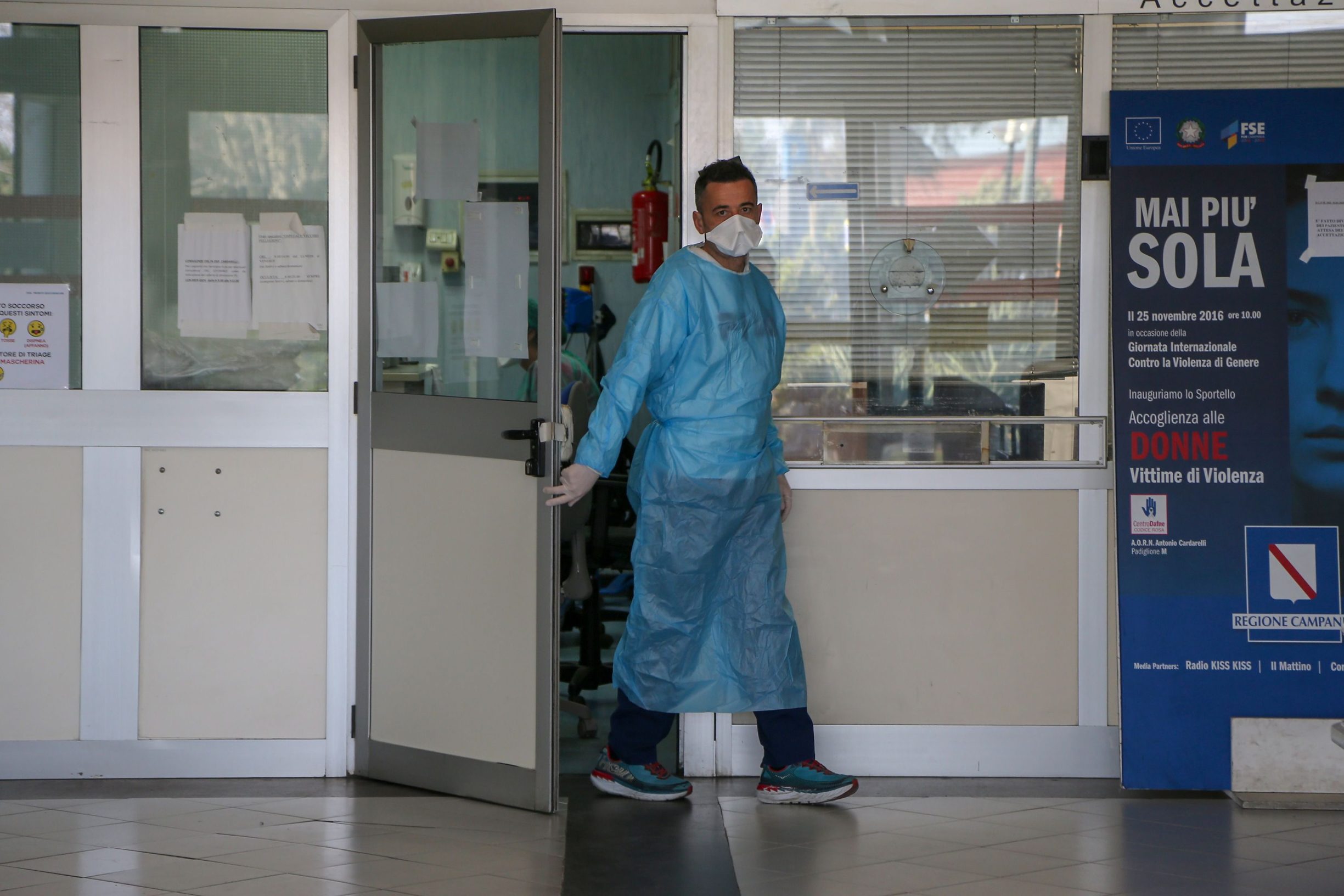 A hospital worker is pictured at the emergencies department of the Cardarelli hospital in Naples on March 11, 2020, a day after Italy imposed unprecedented national restrictions on its 60 million people on March 10 to control the deadly coronavirus. - Its a race against time at the Cardarelli hospital in Naples, where a new intensive care unit is being assembled as southern Italys underfunded and overstretched health care system braces for an epidemic. (Photo by Carlo Hermann / AFP)