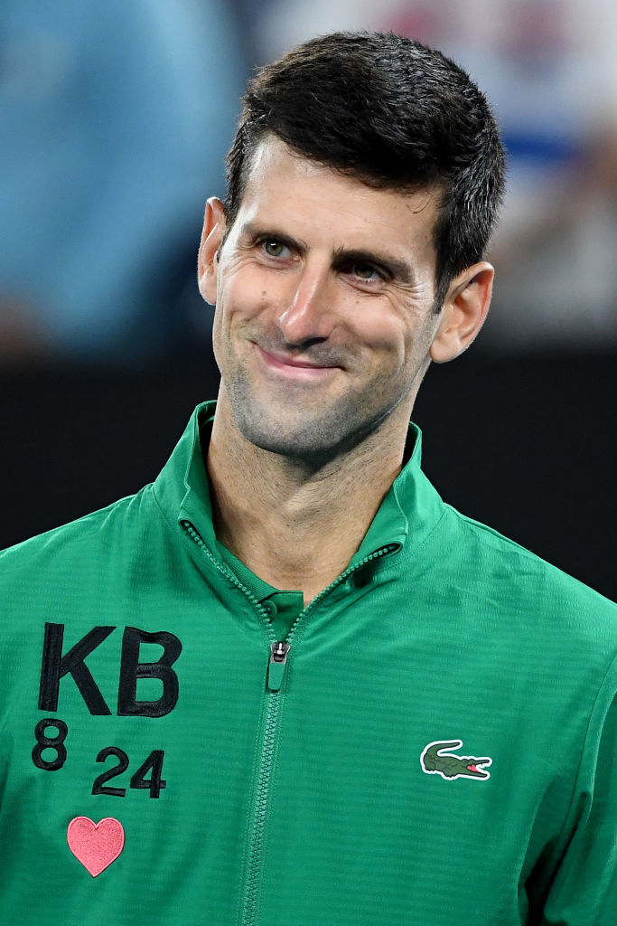 MELBOURNE, AUSTRALIA - JANUARY 28: Novak Djokovic of Serbia celebrates after winning his Men’s Singles Quarterfinal match against Milos Raonic of Canada on day nine of the 2020 Australian Open at Melbourne Park on January 28, 2020 in Melbourne, Australia. (Photo by Hannah Peters/Getty Images)