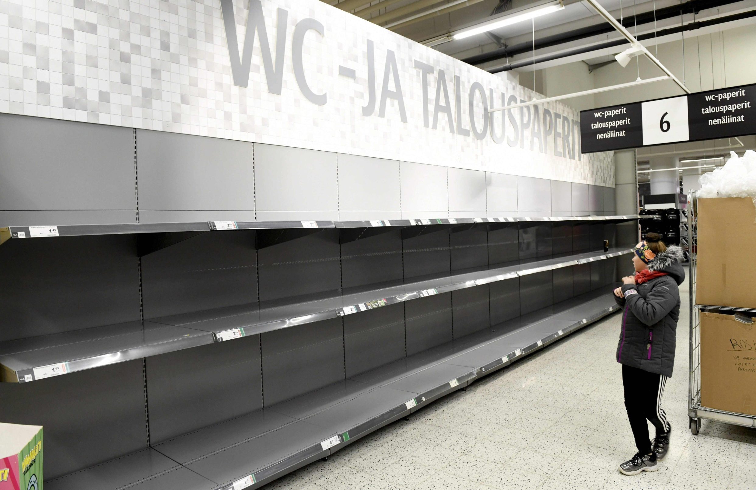 Empty toilet paper shelves are seen at a supermarket in Helsinki, Finland on March 13, 2020 as consumers worry about product shortages due to the outbreak of the novel coronavirus COVID-19. (Photo by Heikki Saukkomaa / Lehtikuva / AFP) / Finland OUT