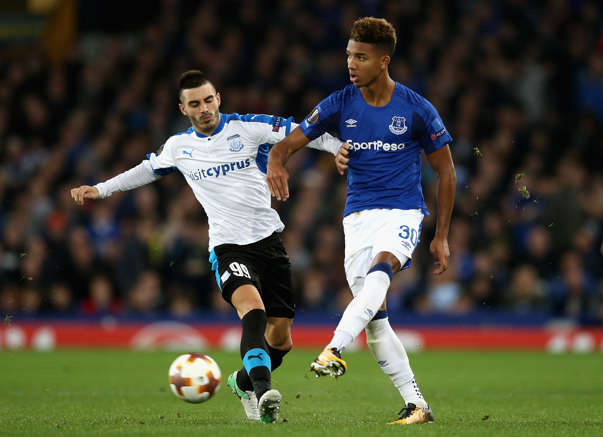LIVERPOOL, ENGLAND - SEPTEMBER 28:  Mason Holgate of Everton and Anton Maglica of Apollon Limassol in action during the UEFA Europa League group E match between Everton FC and Apollon Limassol at Goodison Park on September 28, 2017 in Liverpool, United Kingdom.  (Photo by Jan Kruger/Getty Images)